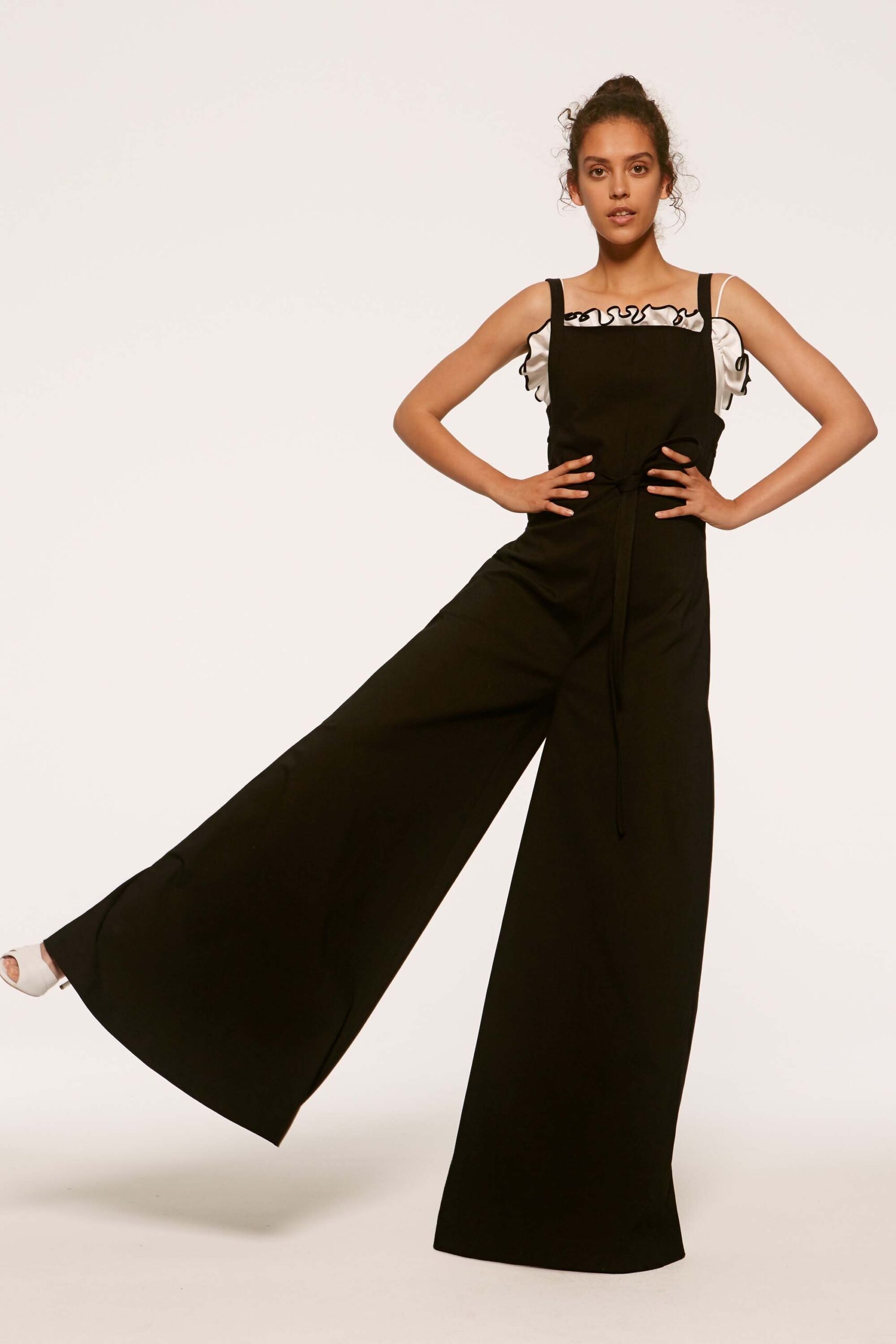 black fitted jumpsuit with ruffles