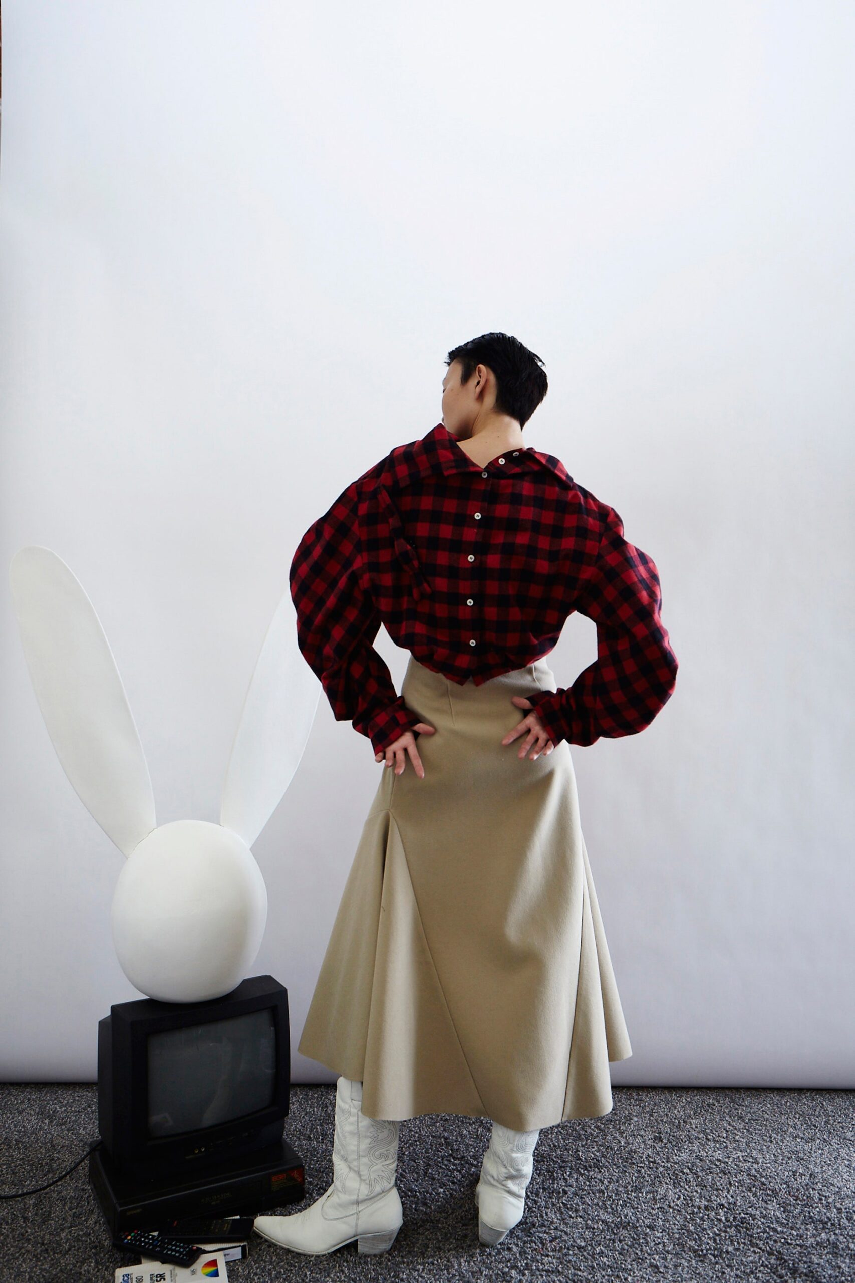 relaxed checked shirt with asymmetric skirt