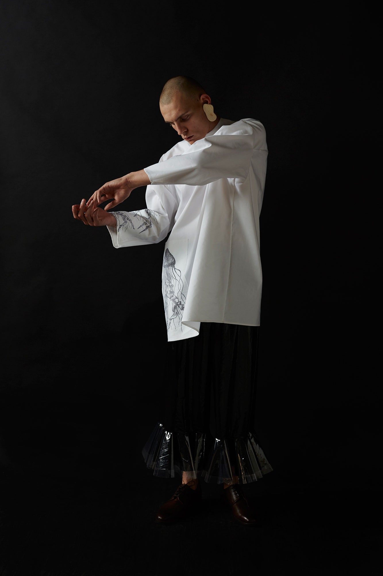 white relaxed shirt with black skirt