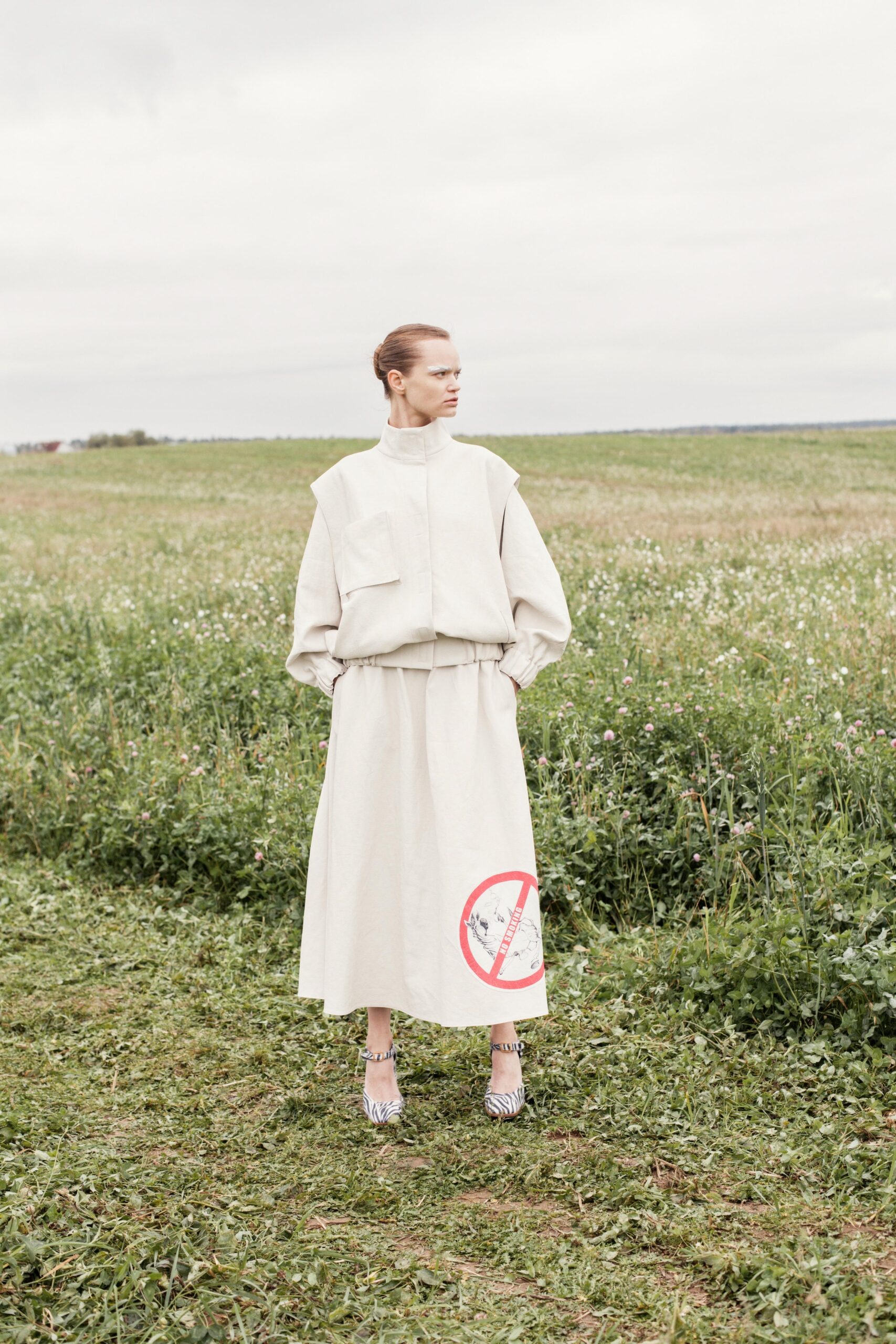 beige relaxed top and midi skirt