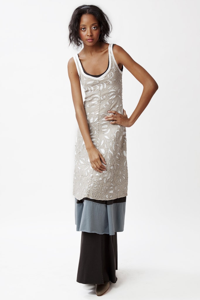 beige embroidered sleeveless dress with layered skirts