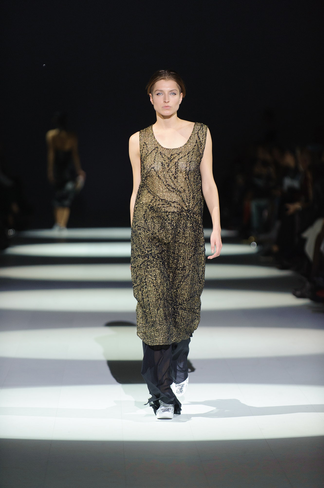 gold draped midi dress with black pants