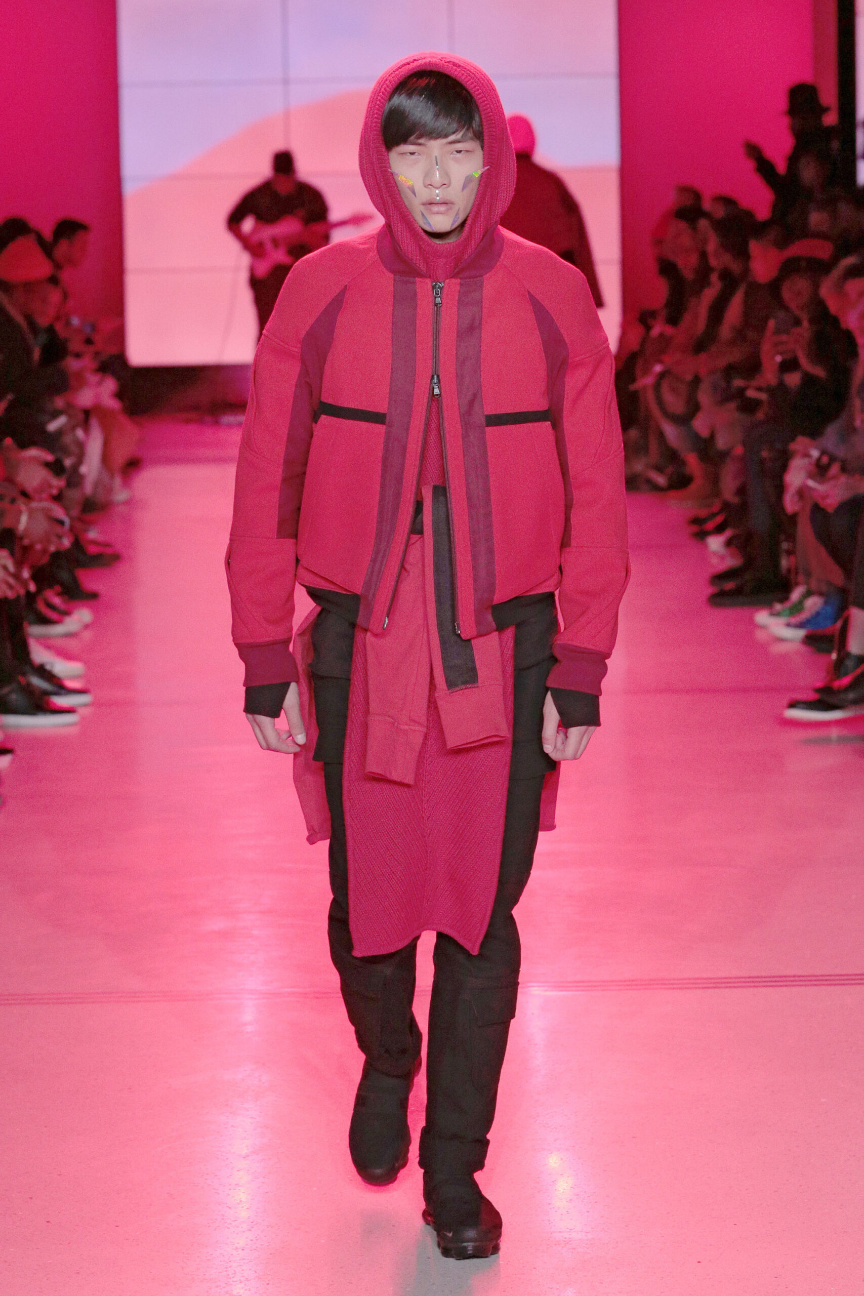 red relaxed hoodie with black pants