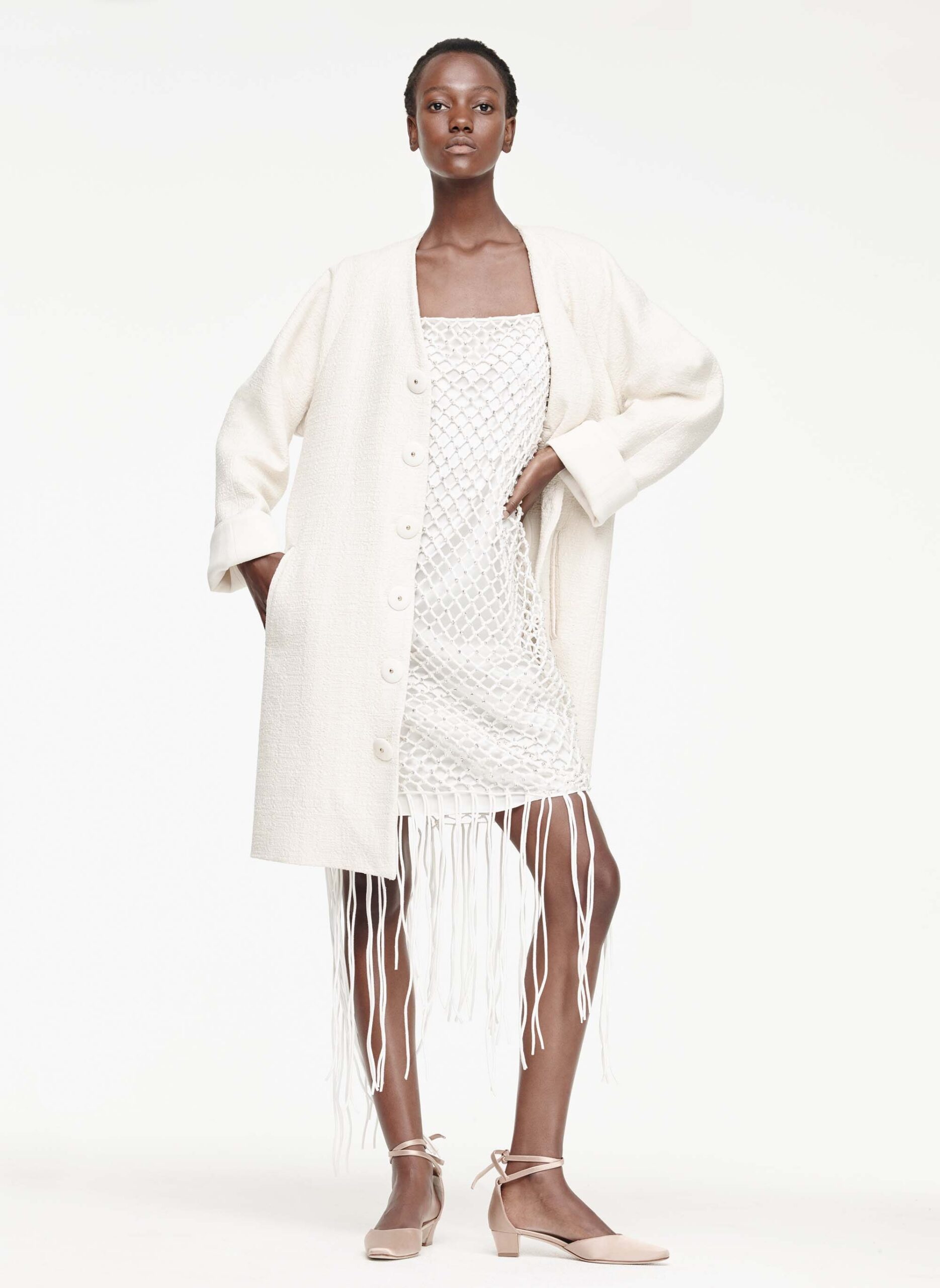 white cotton long-sleeve collared oversized buttoned pockets coat