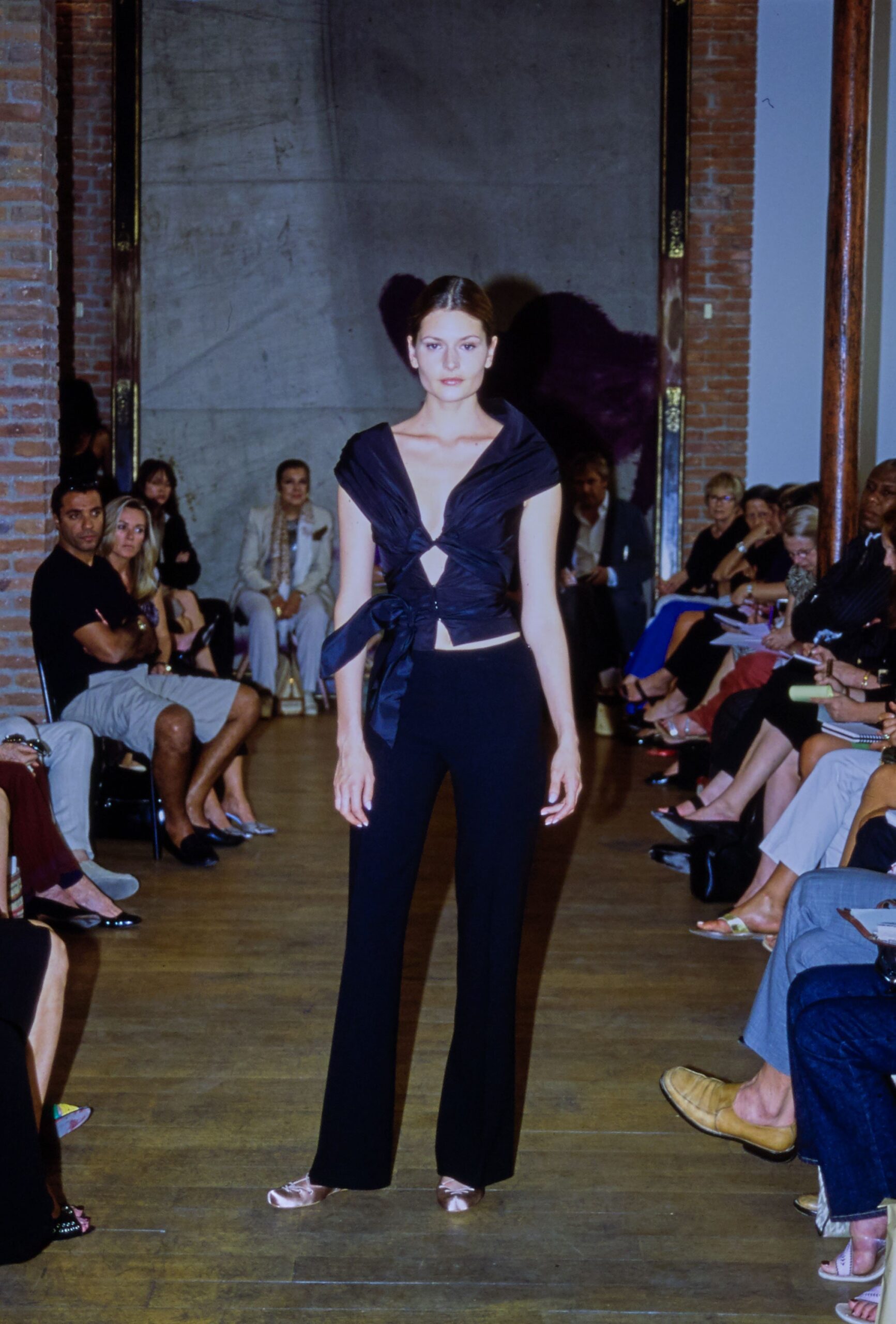 black silk top and fitted pants