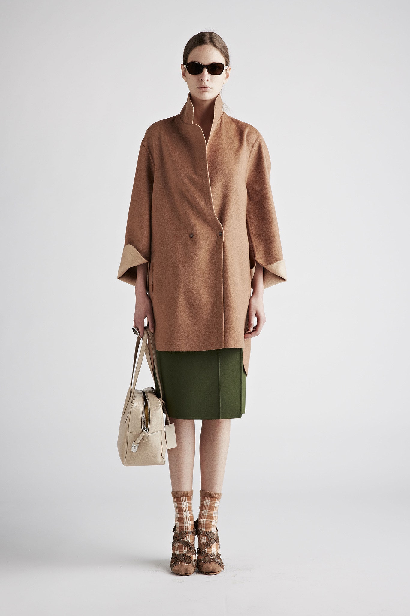 brown wool relaxed coat with green pencil skirt