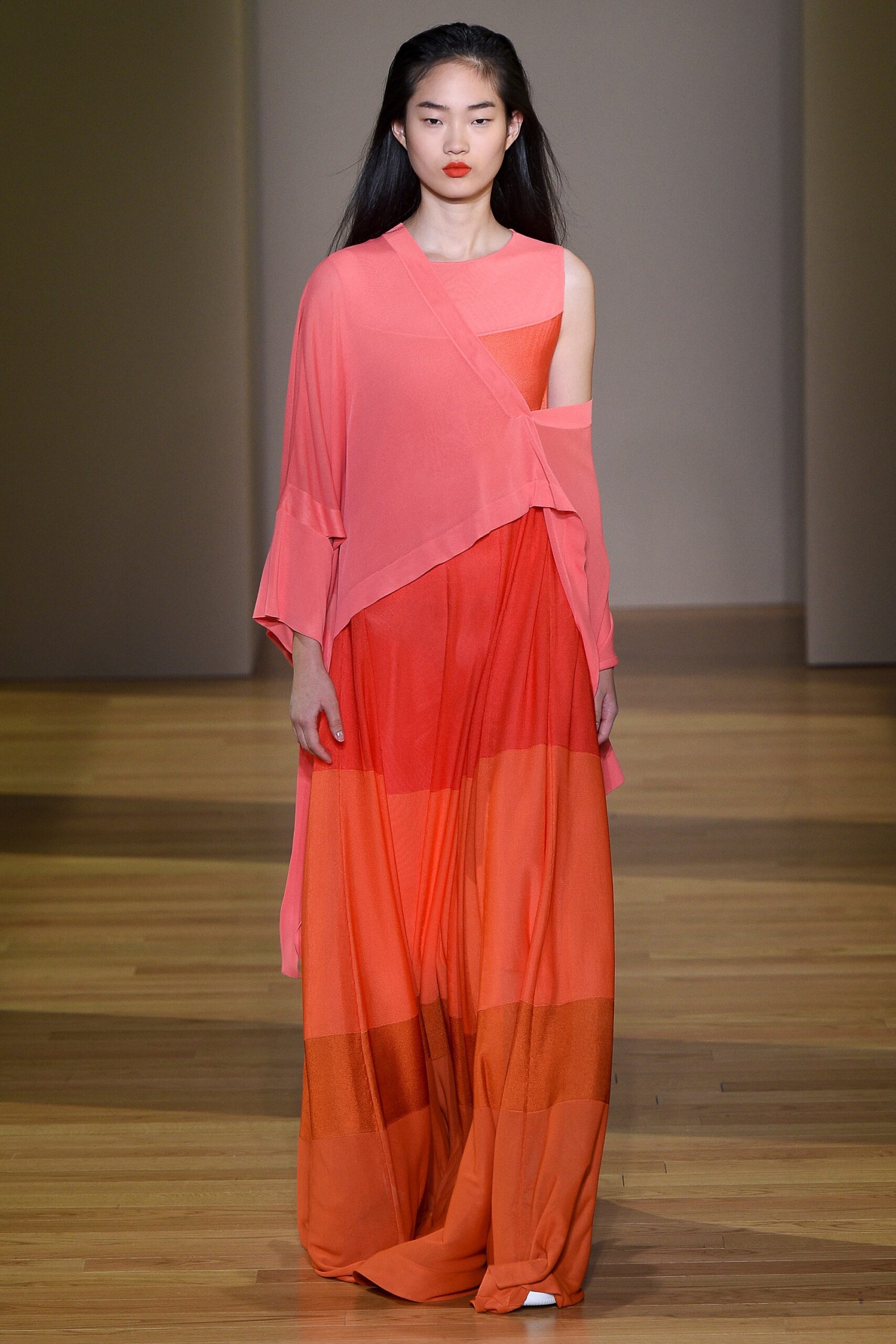 flowing pink and orange maxi dress with cape