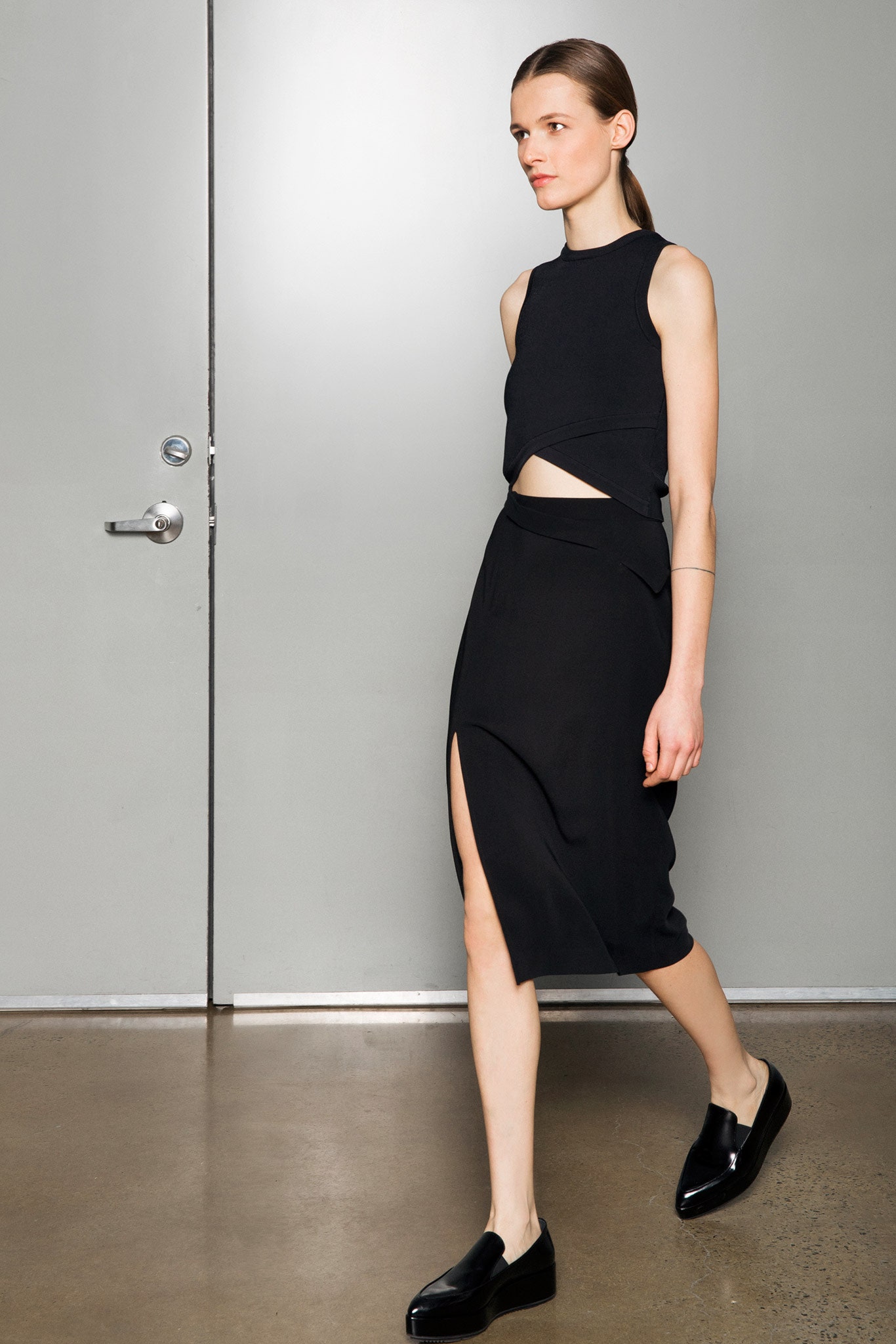 black cotton sleeveless high-neck fitted top