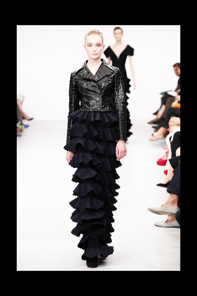 black leather jacket and tiered dress