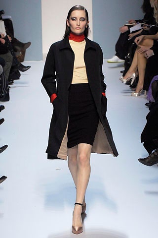 black coat beige turtleneck black pencil skirt