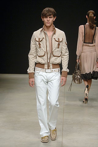 beige fitted jacket with white pants