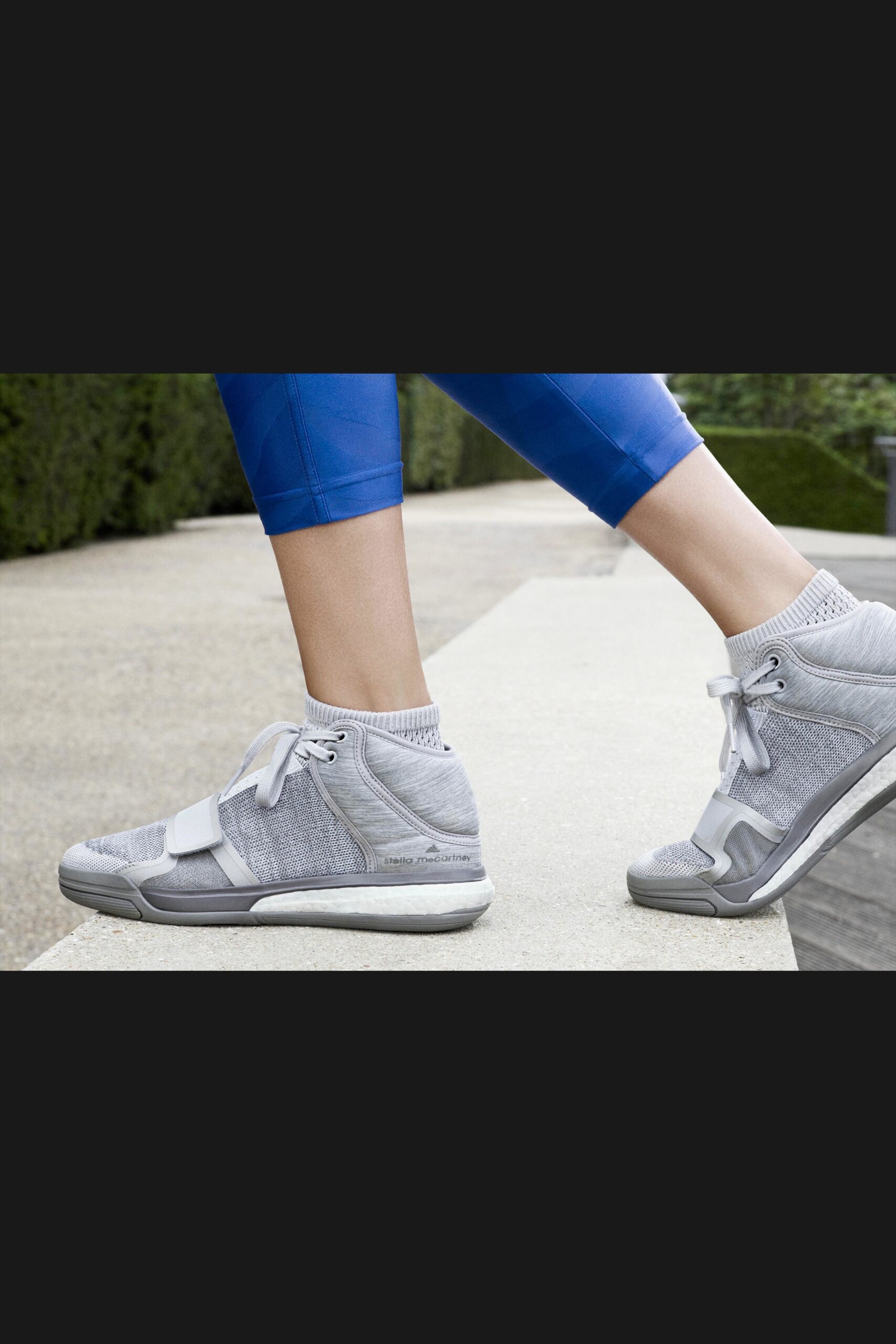 blue fitted pants with gray shoes