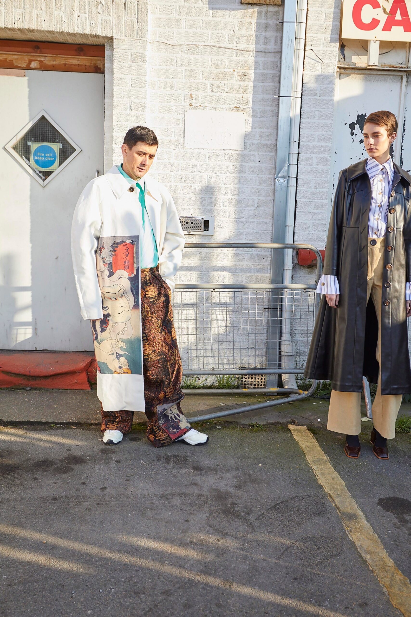 white relaxed coat with brown wide-leg pants