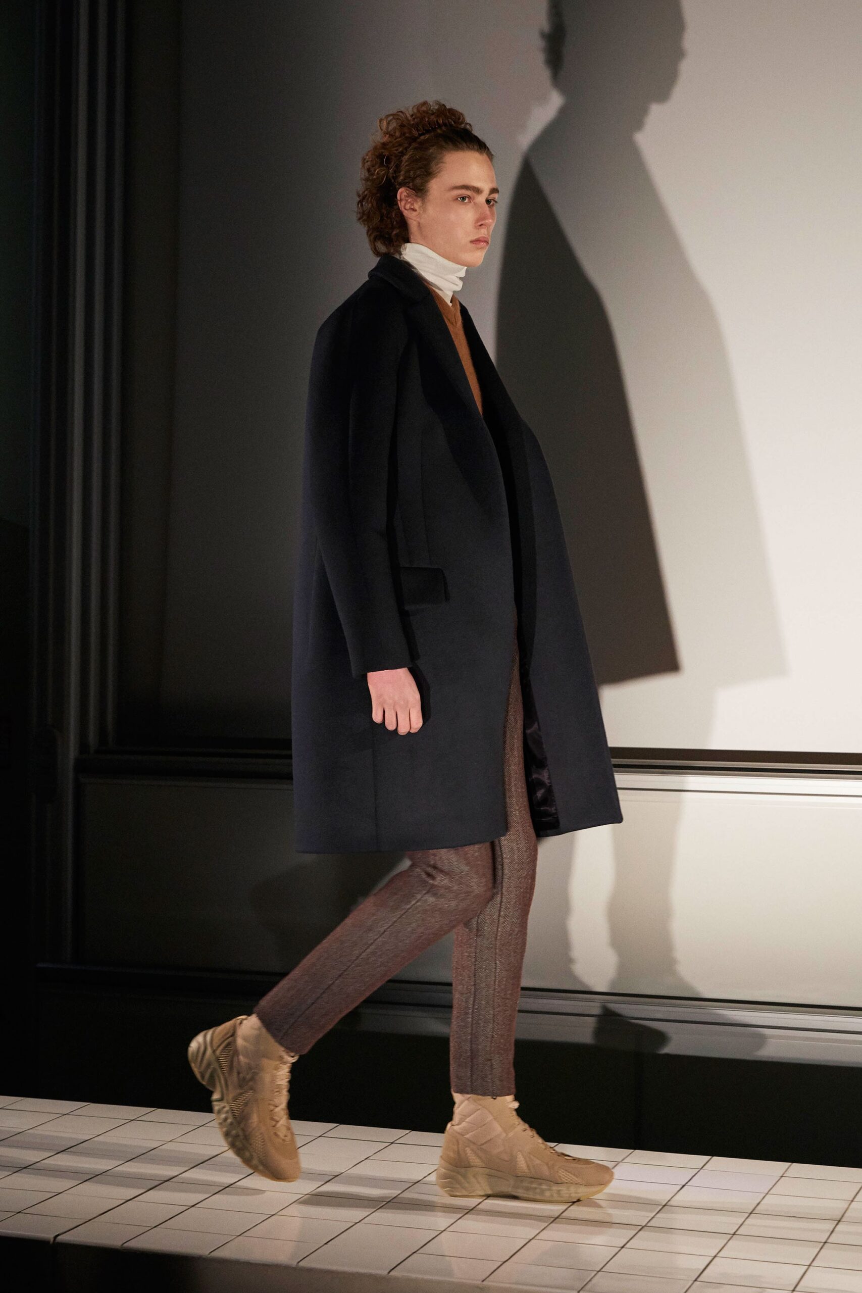 black wool coat with fitted top