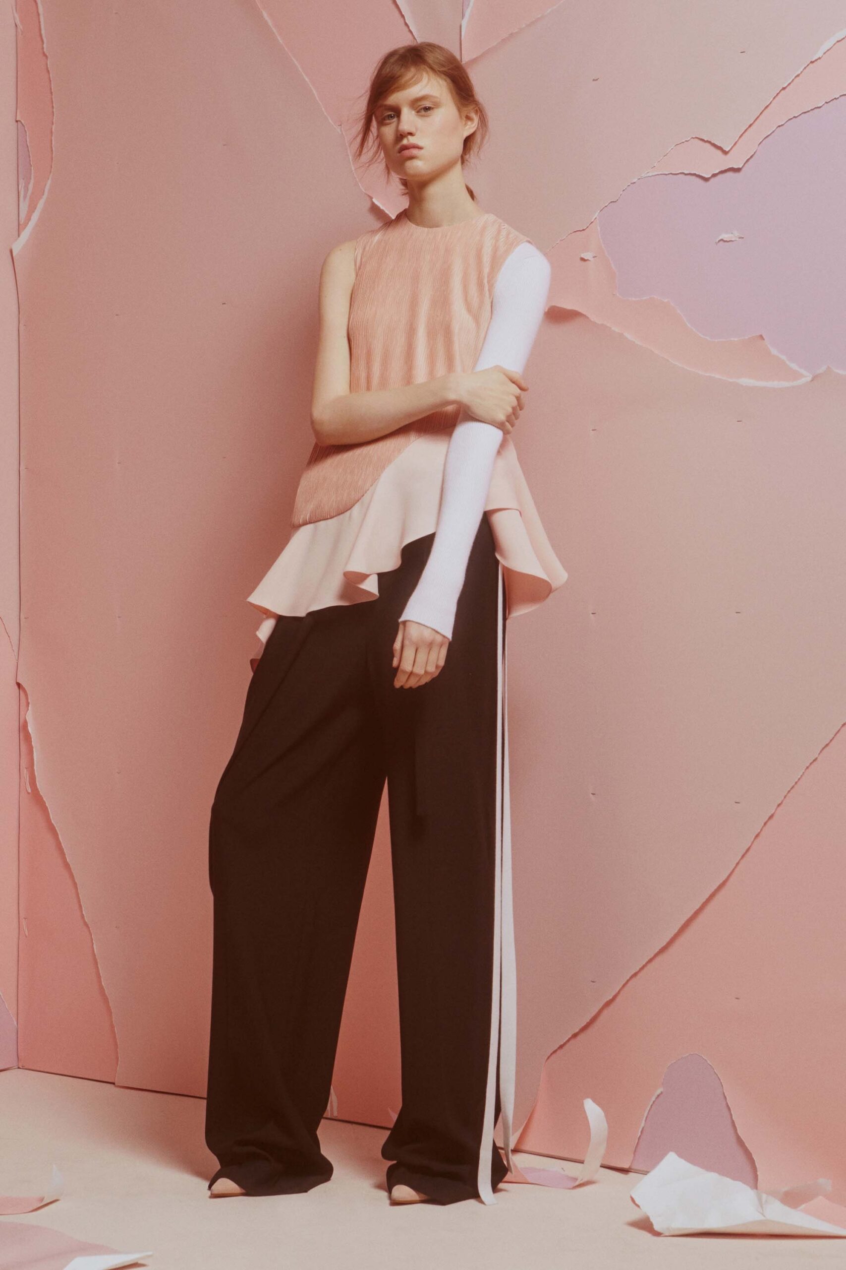 pink silk sleeveless high-neck fitted ruffled top