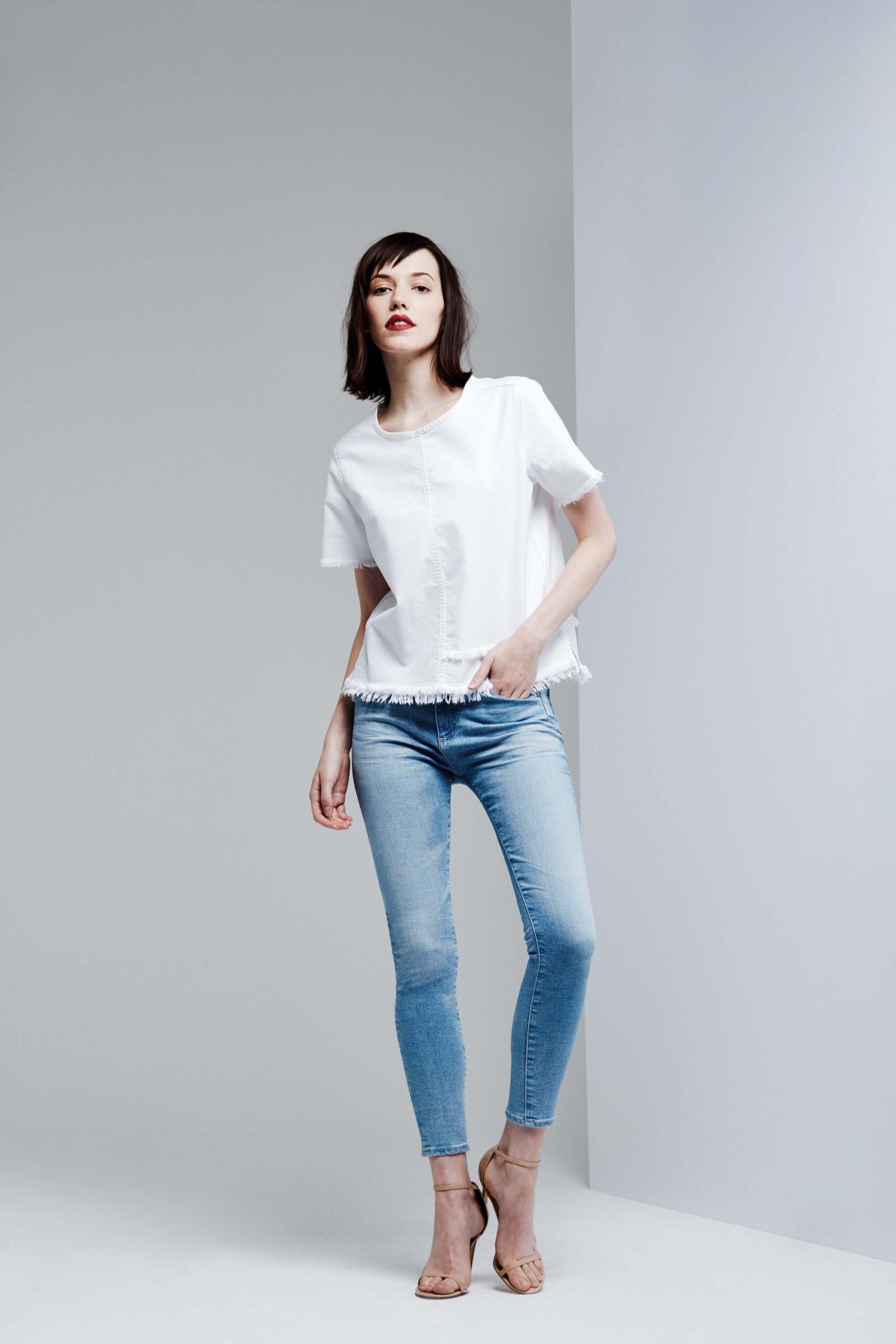 white fitted top with blue jeans