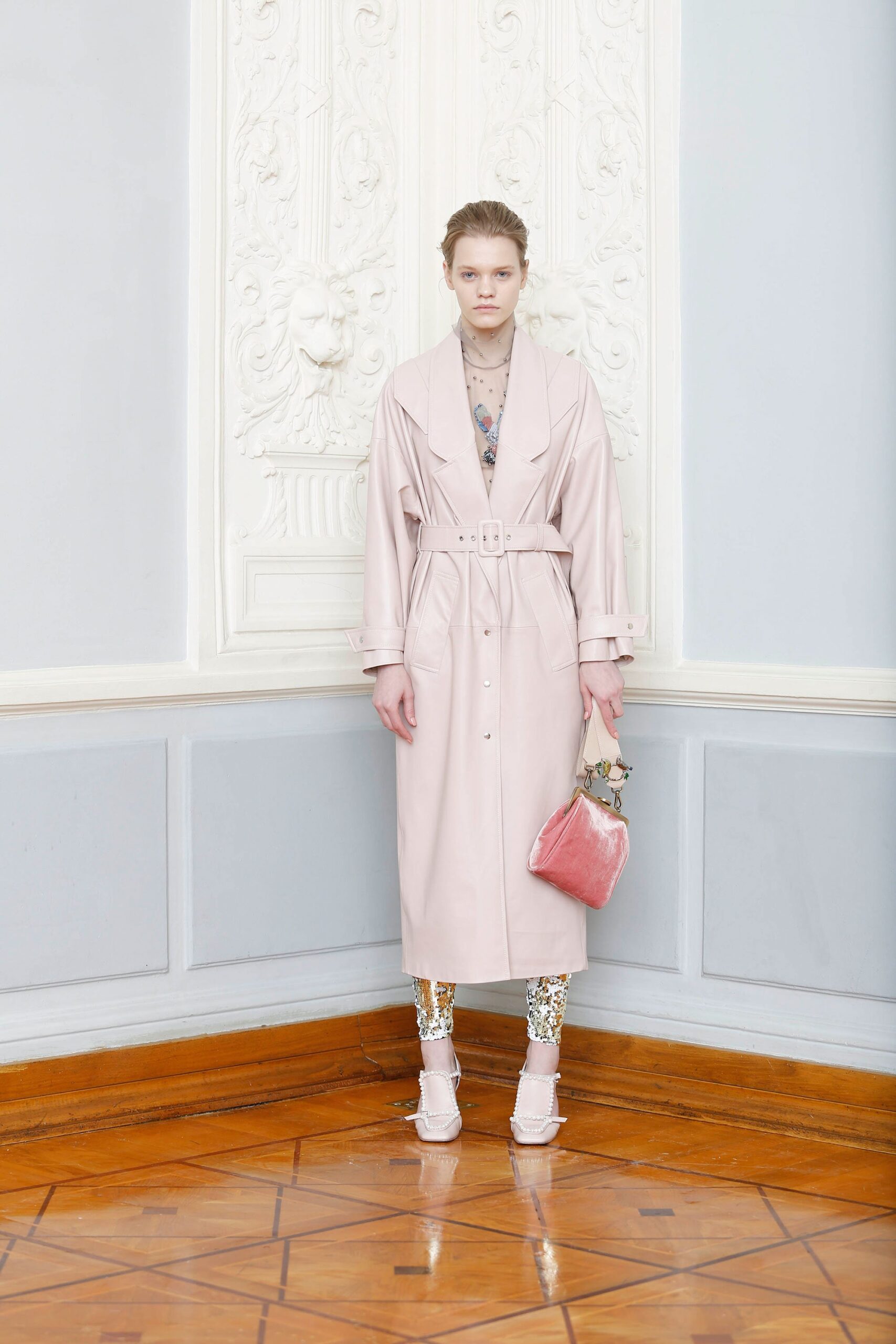 pink belted coat with printed pants