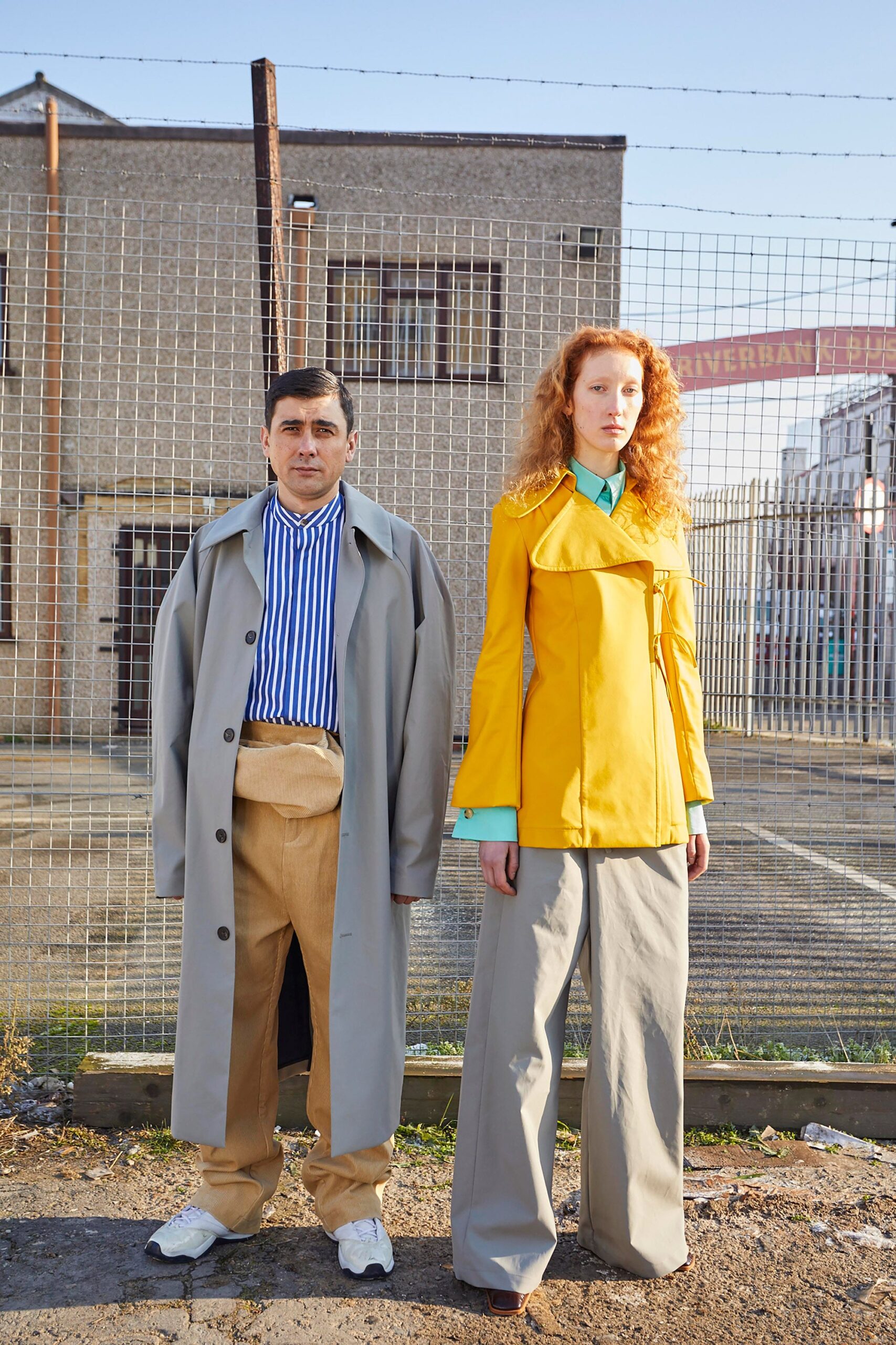 gray coat with yellow top