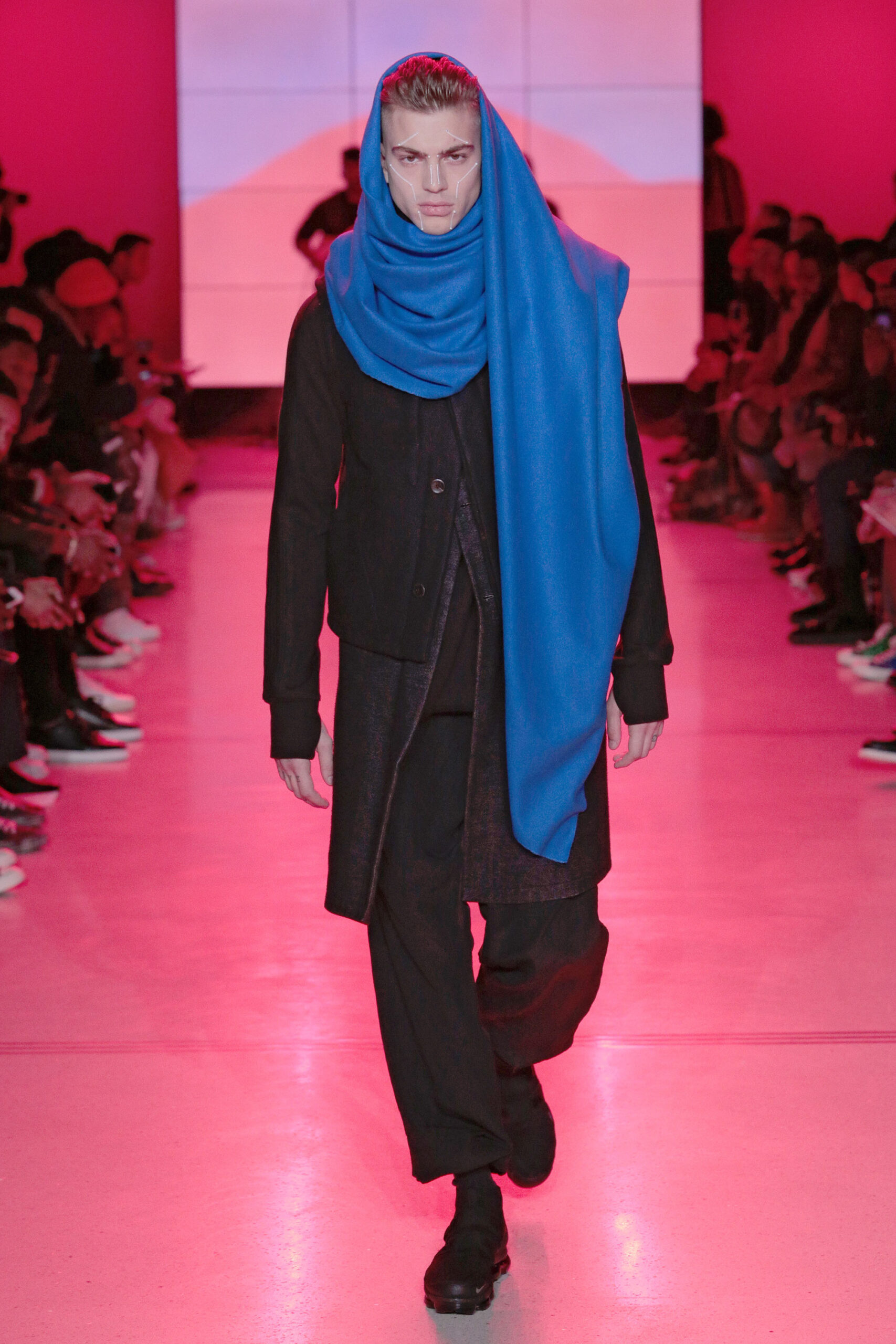 black coat blue scarf outfit