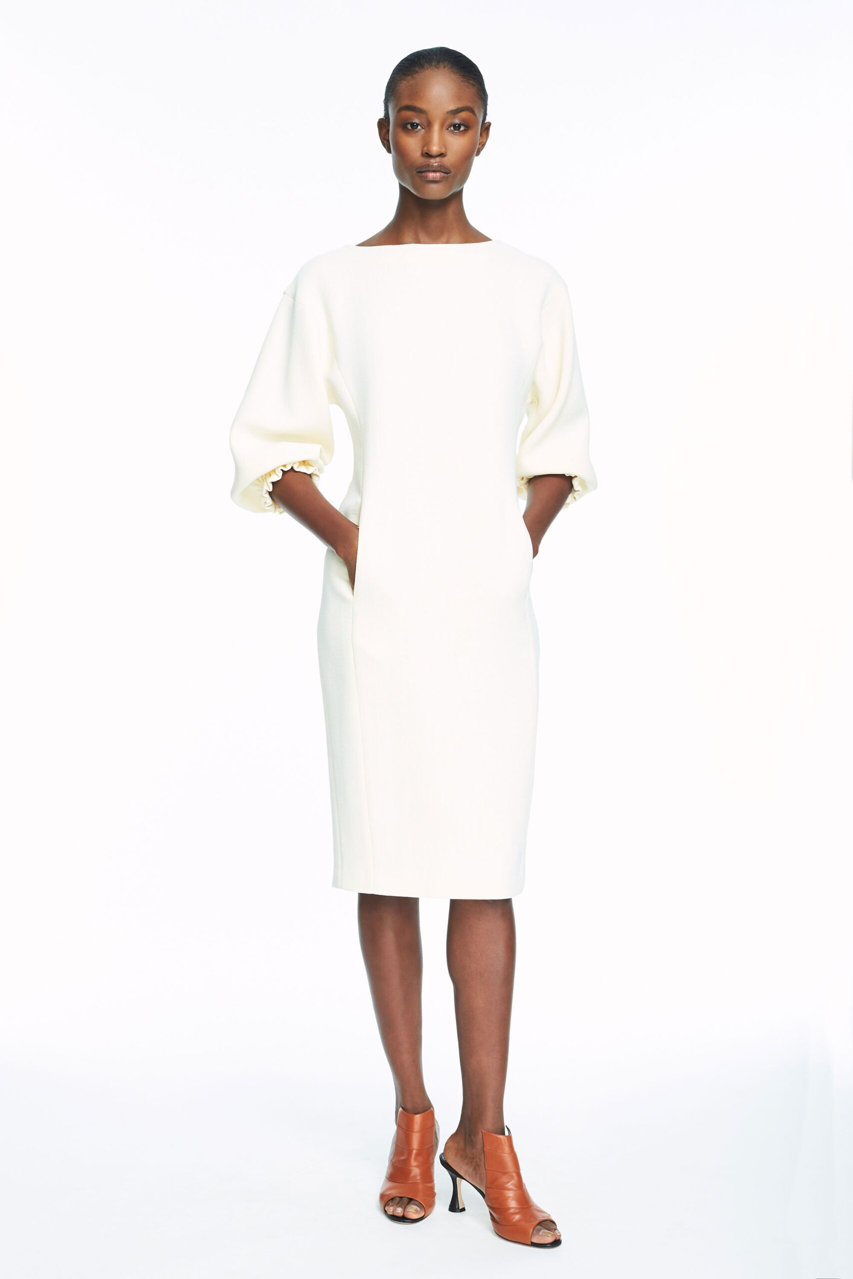 white cotton long-sleeve high-neck fitted straight-leg pockets dress