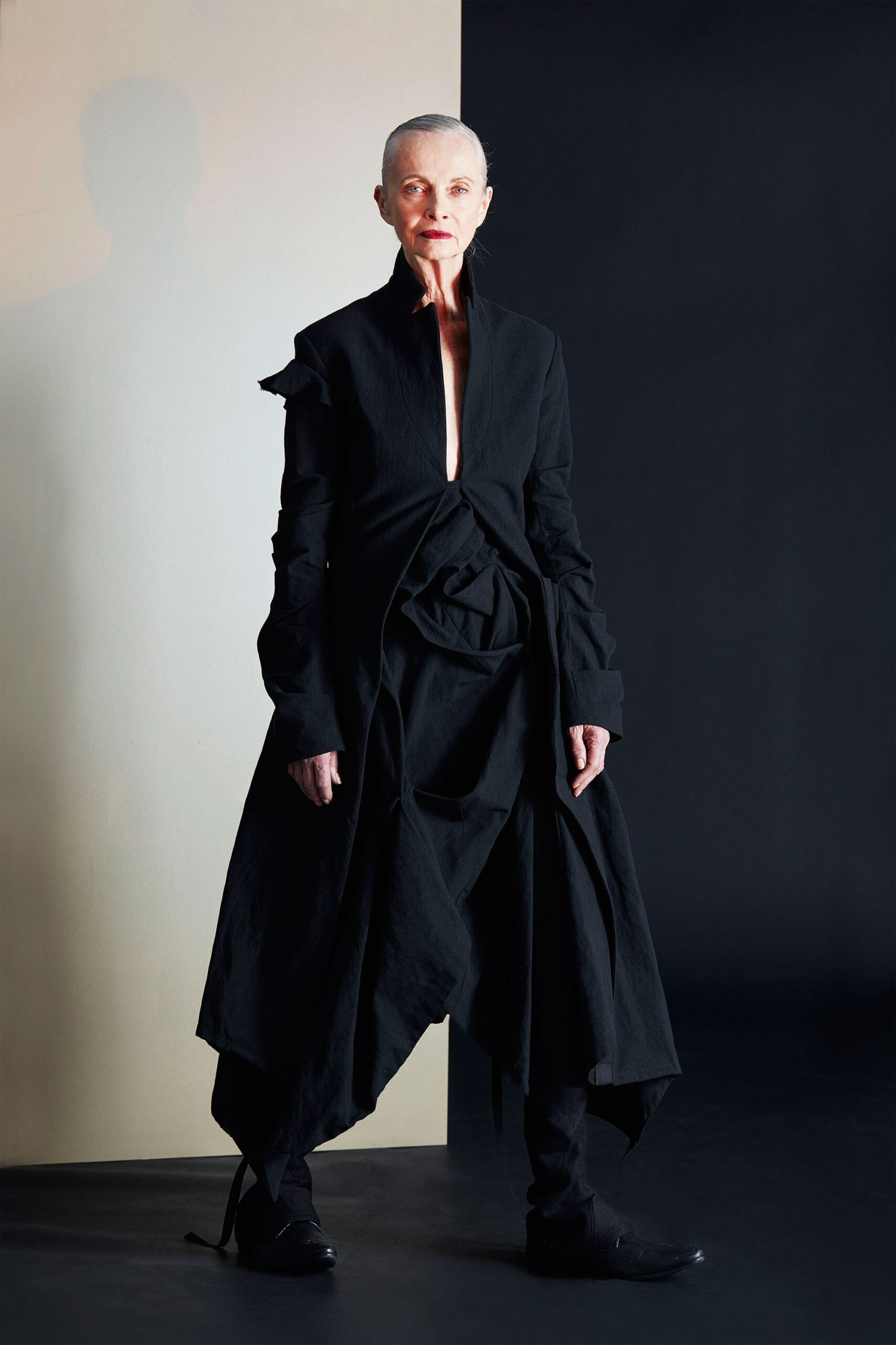 black draped midi dress with fitted pants