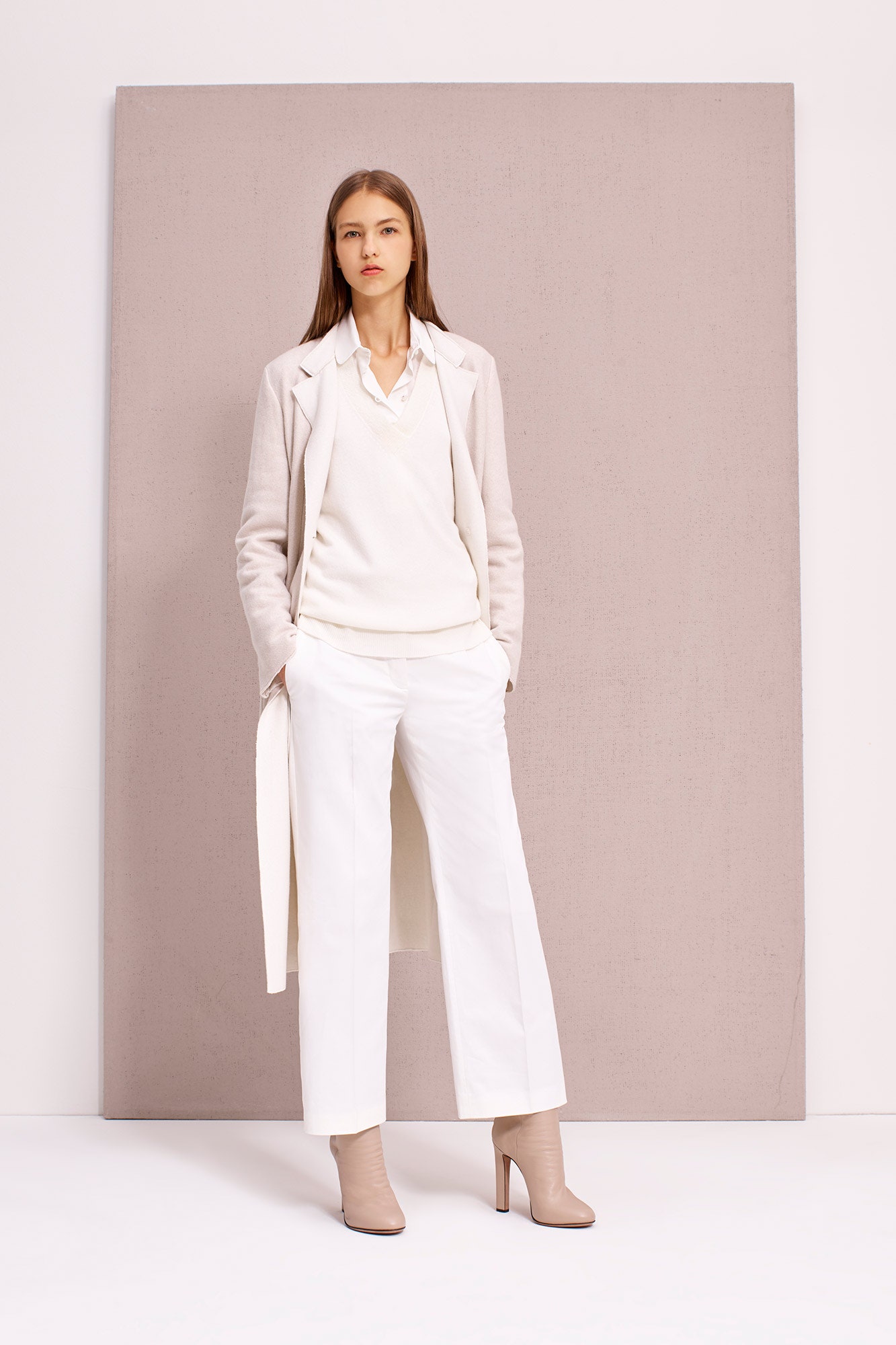 beige coat with white sweater and pants