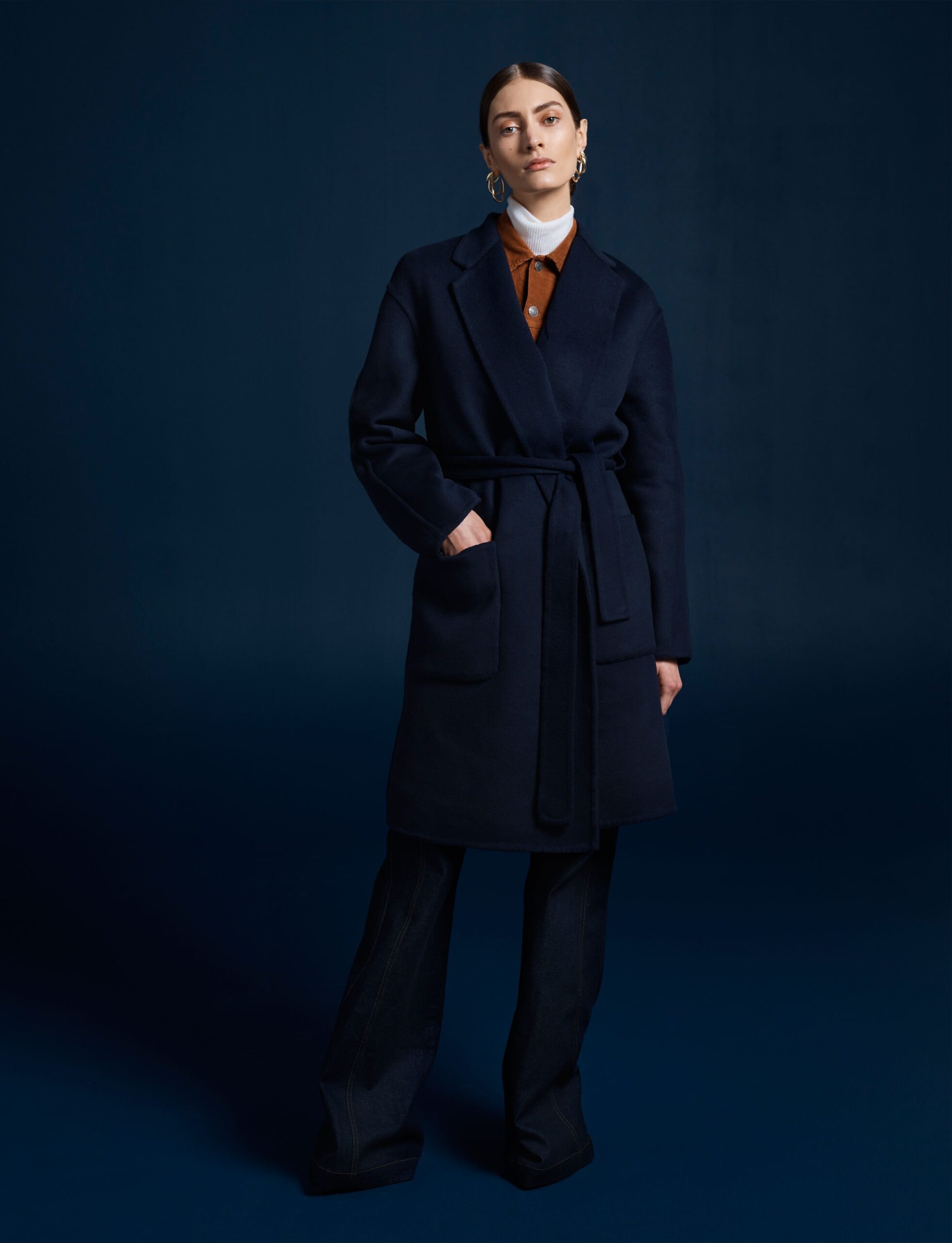 black wool long-sleeve collared tailored belted coat