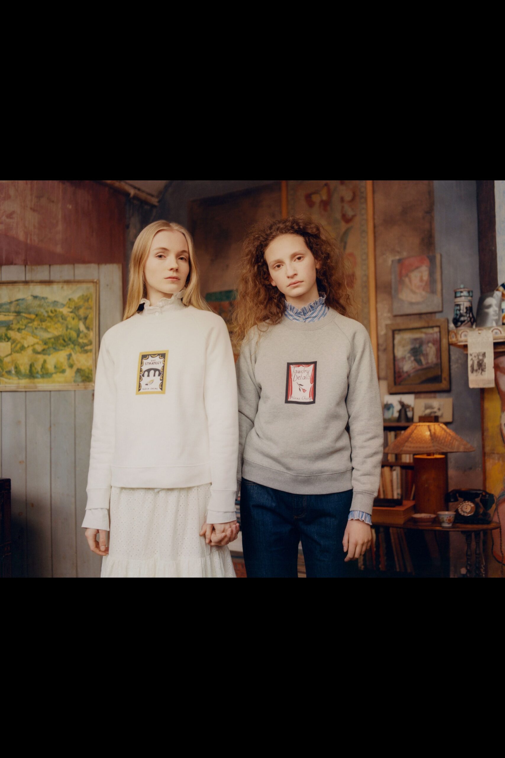 white and gray embroidered sweaters
