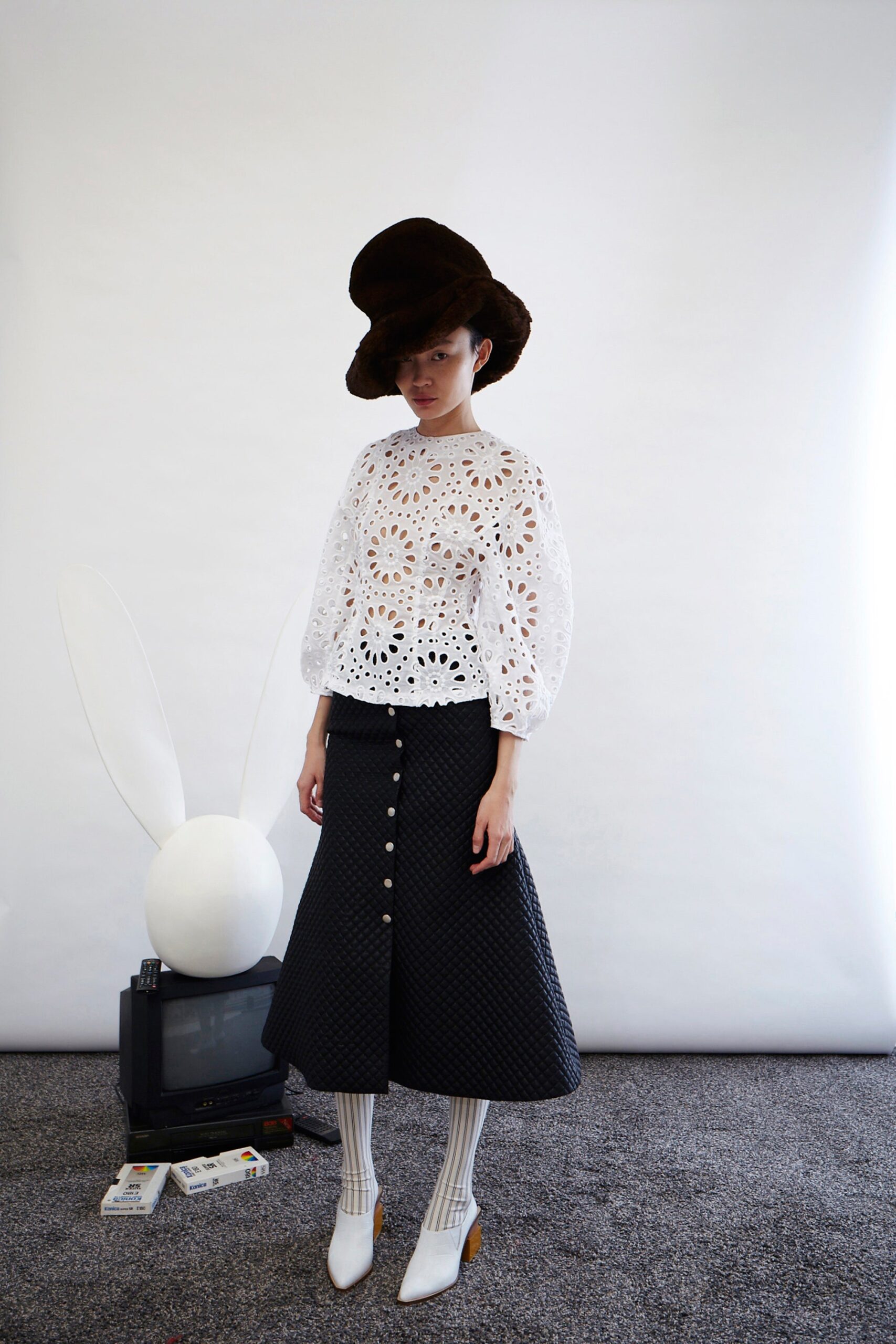 white embroidered blouse black skirt