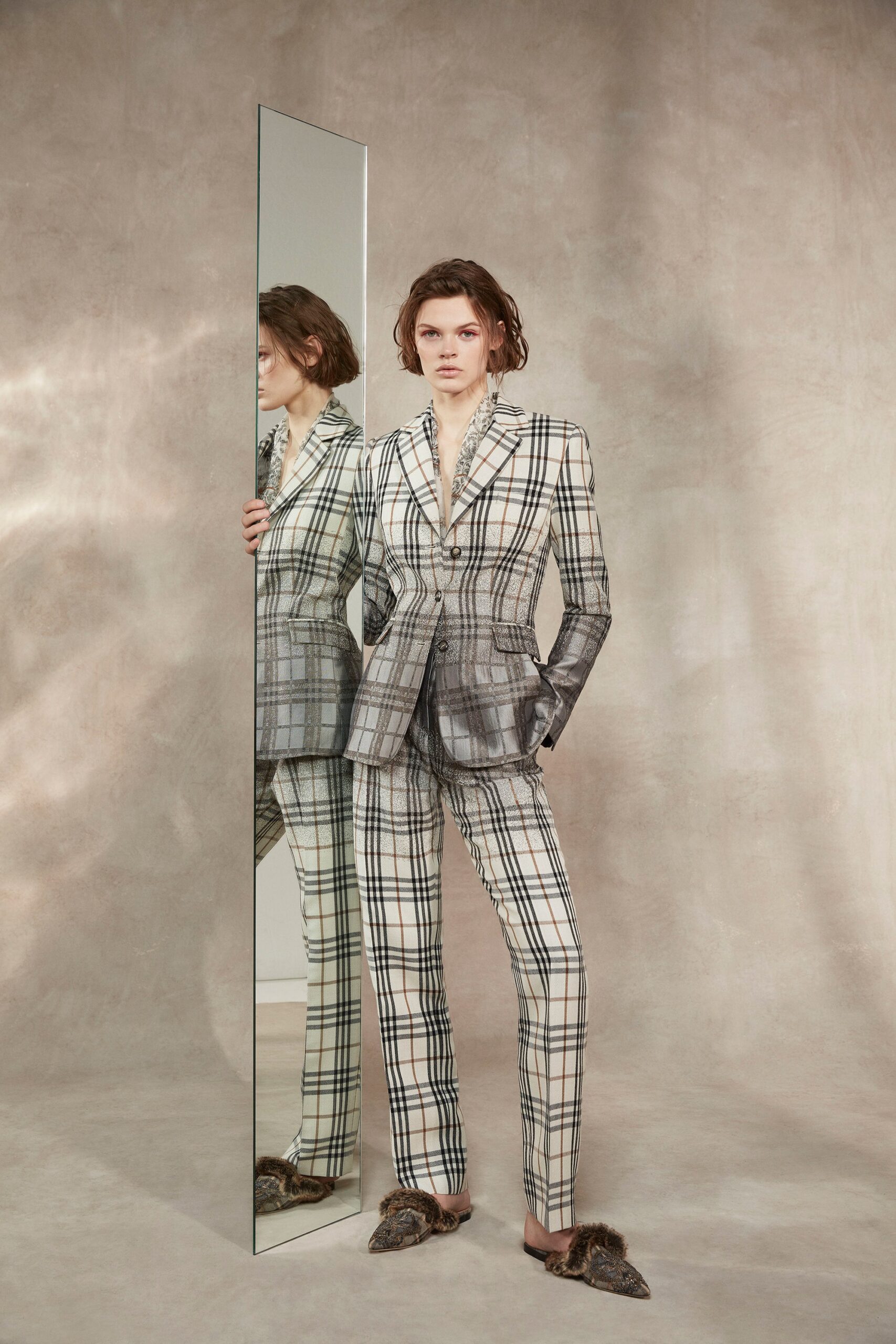 beige and black checked suit