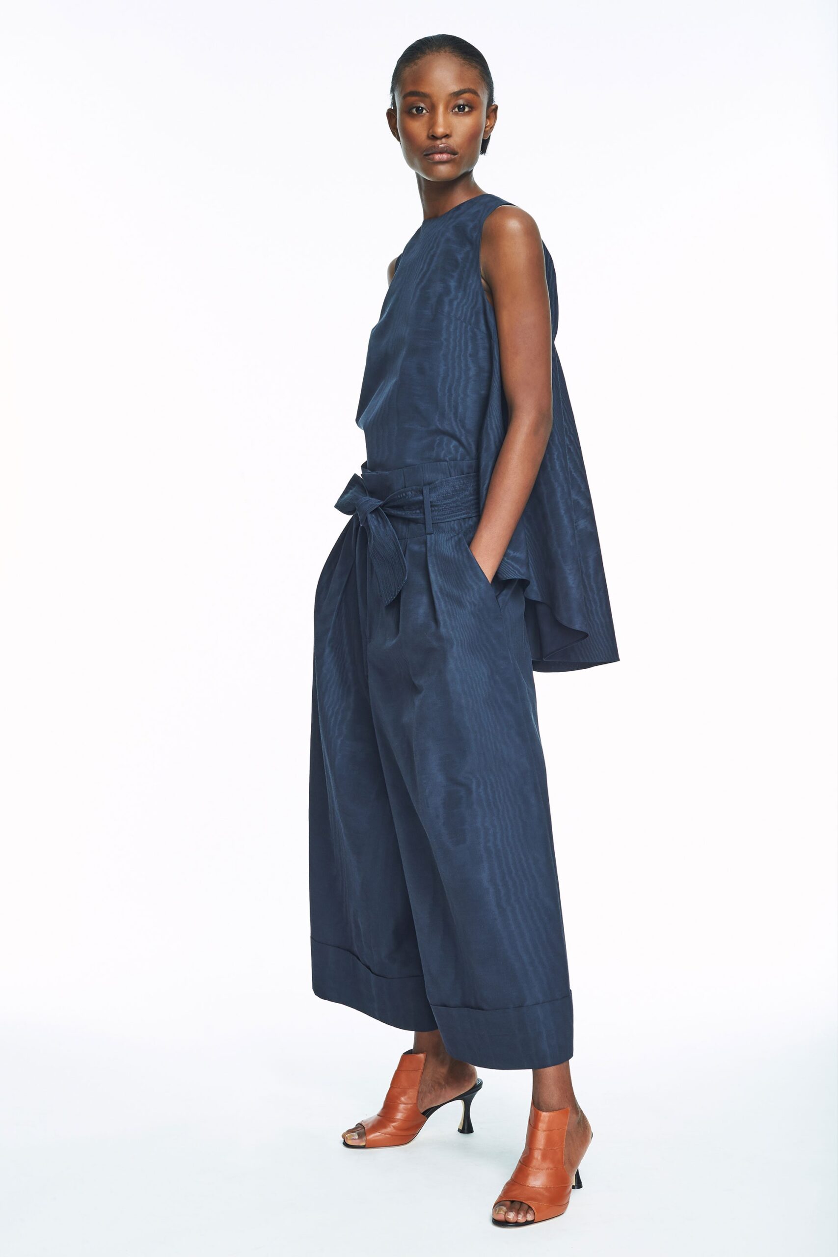 blue cotton sleeveless high-neck relaxed draped top