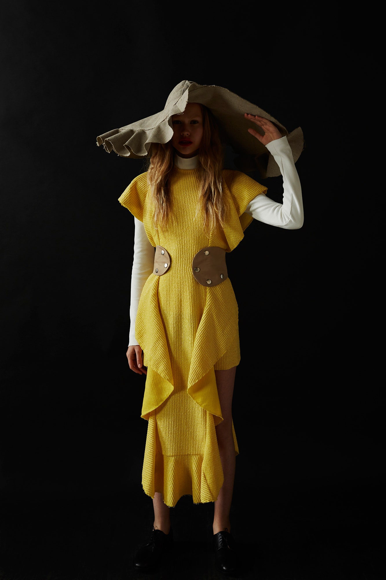 yellow tiered midi dress with oversized hat