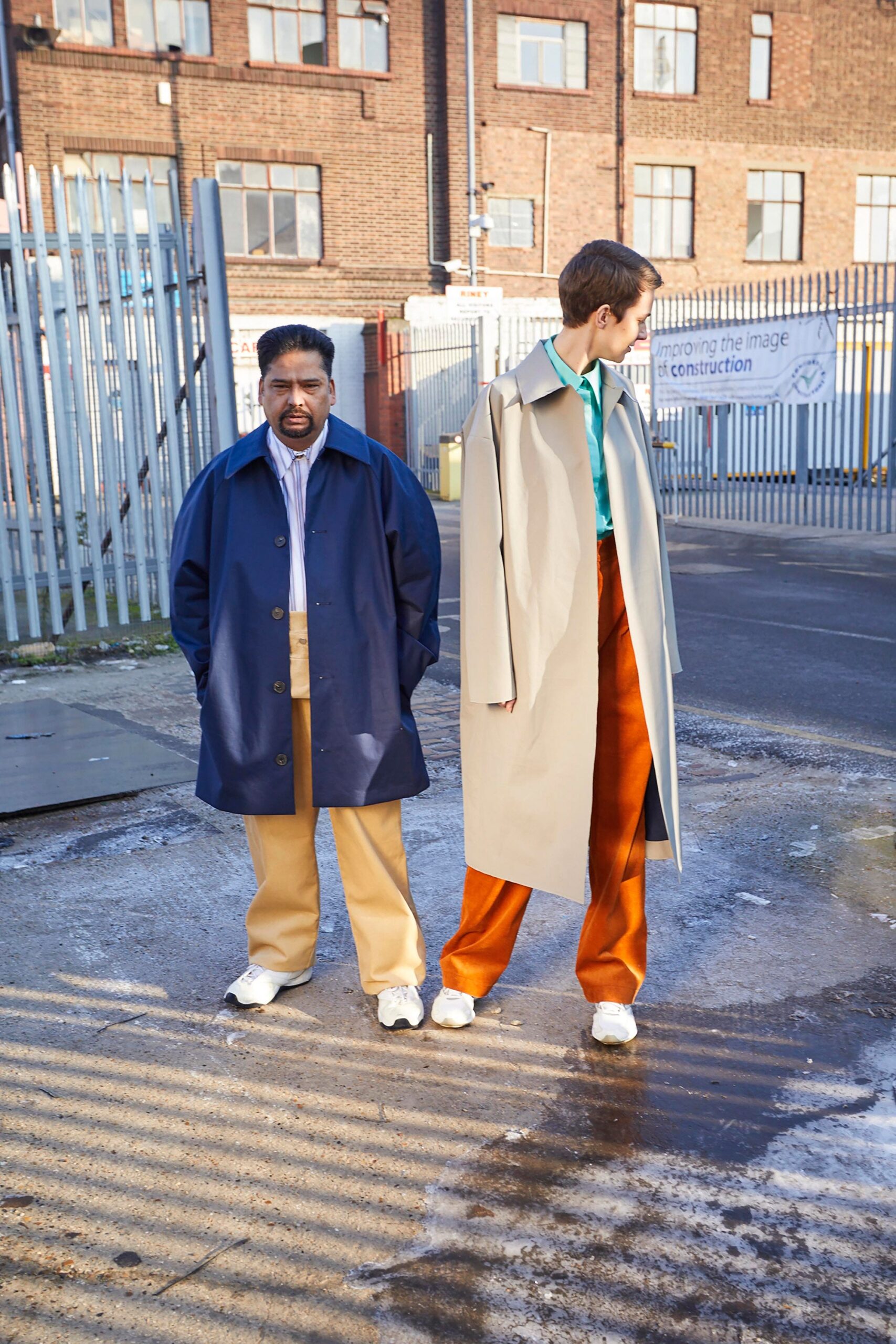 beige coat with orange pants