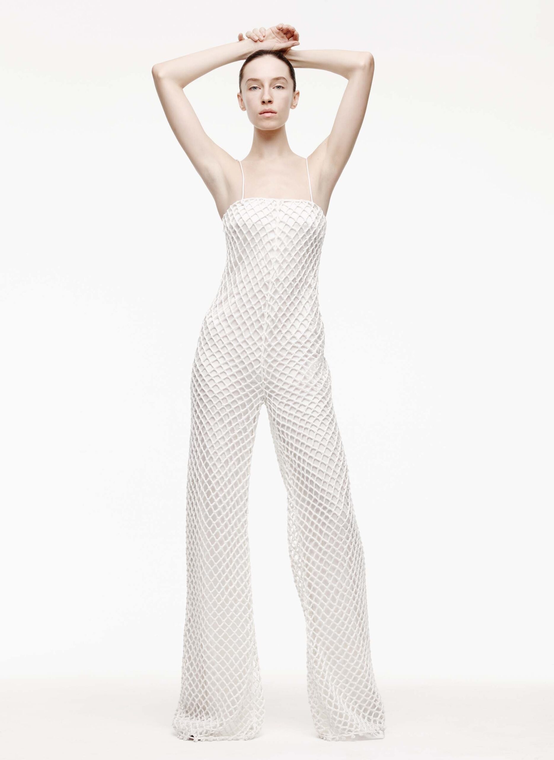 white fitted sleeveless jumpsuit