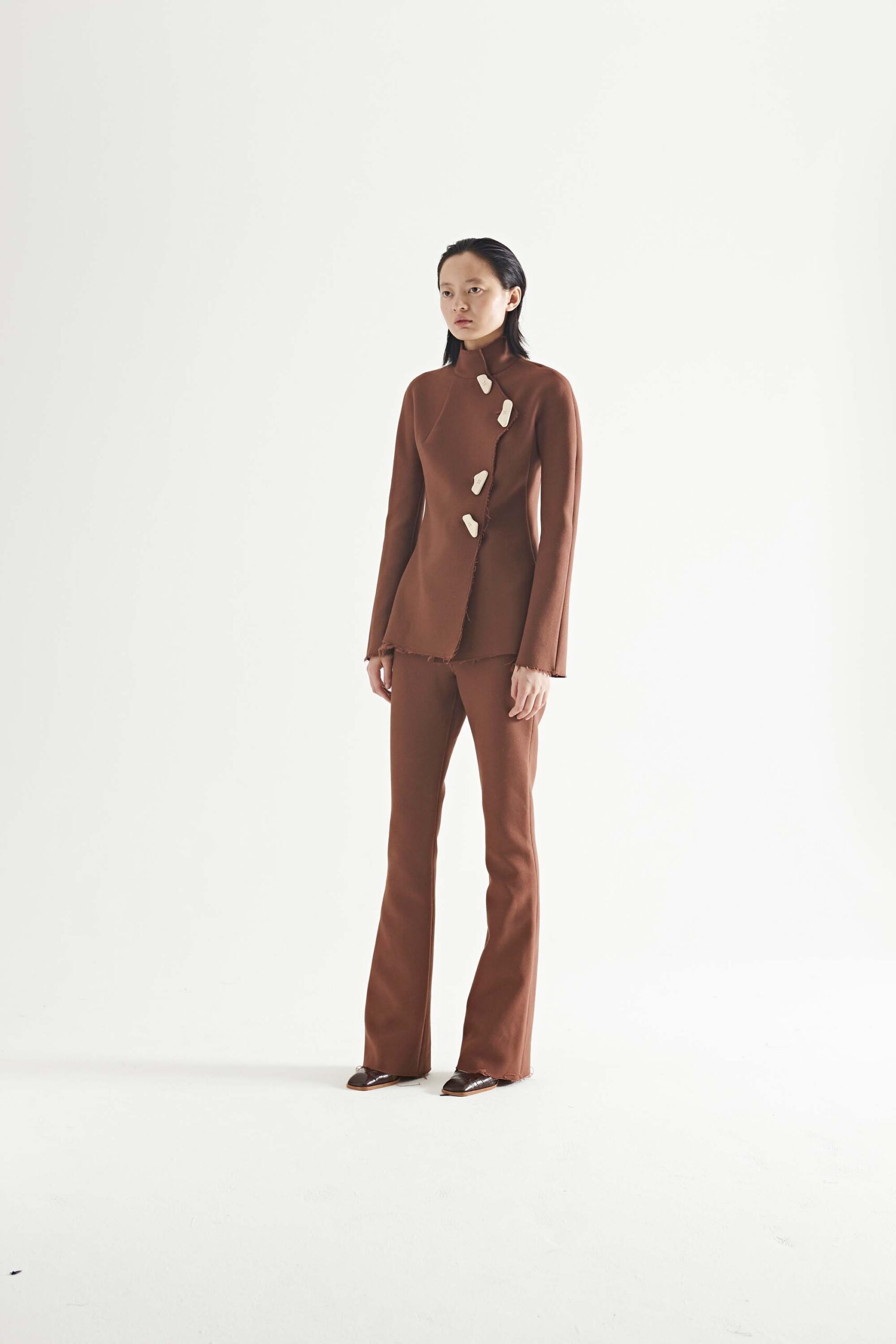 brown fitted blazer and pants