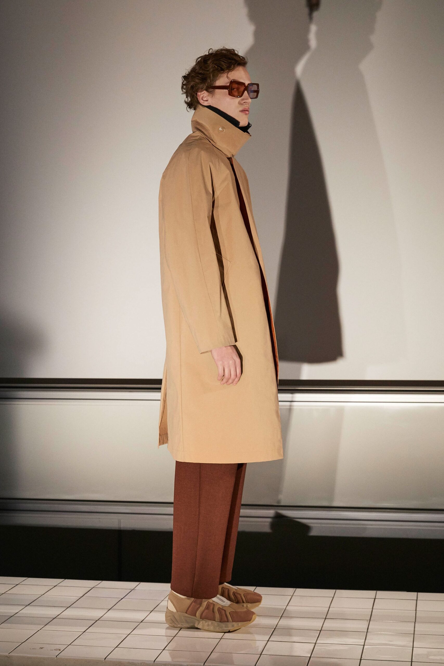 beige coat brown pants tan shoes