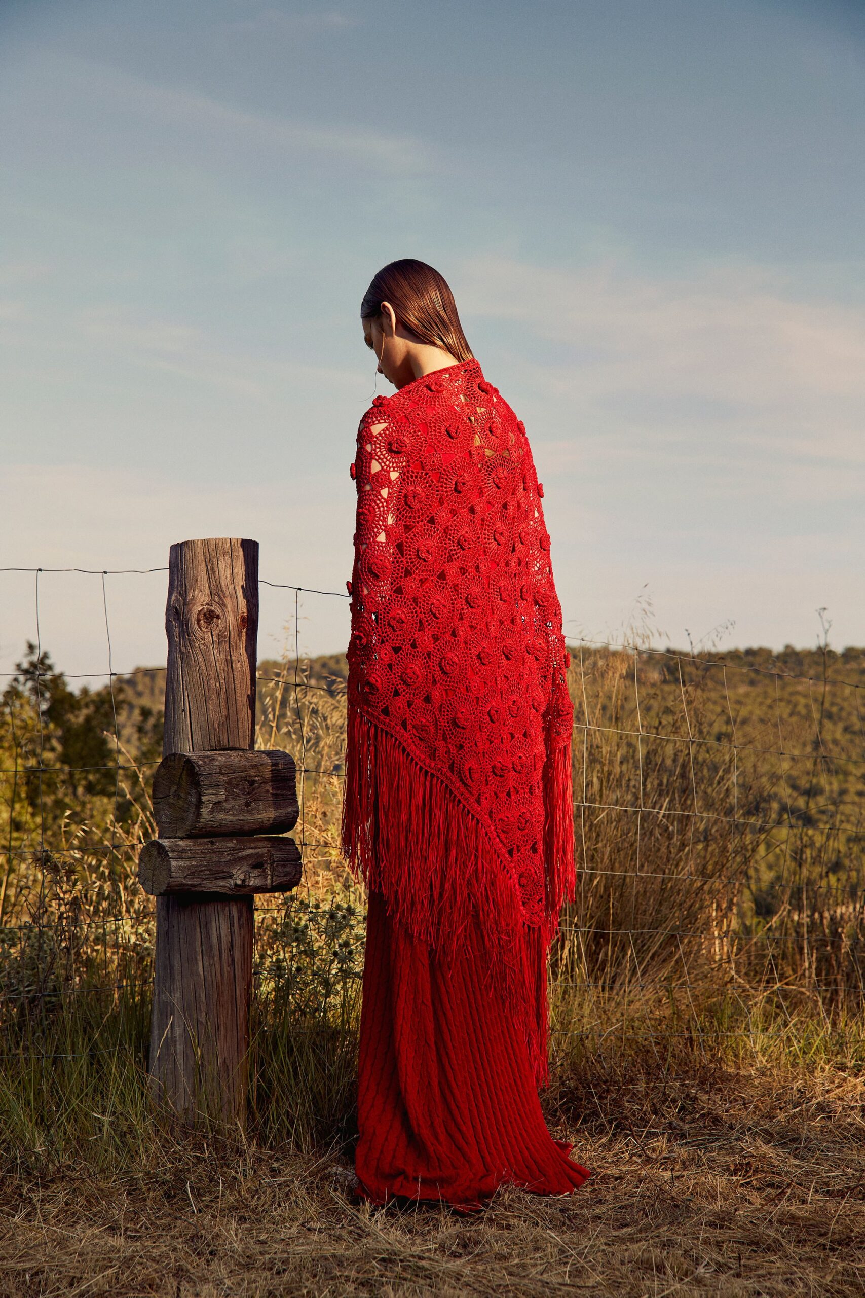 red pleated maxi dress with cape