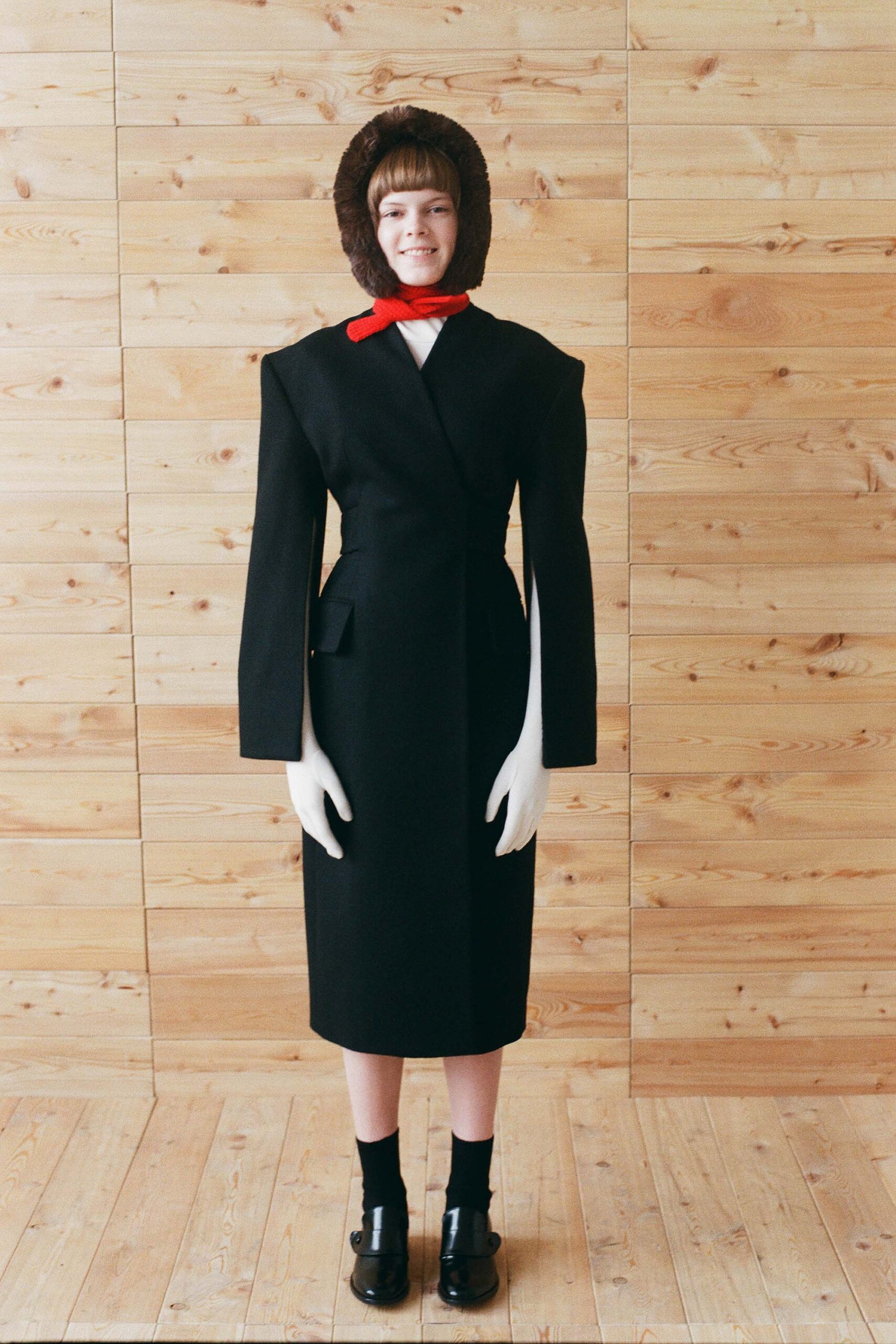 black wool long-sleeve collared fitted structured midi coat