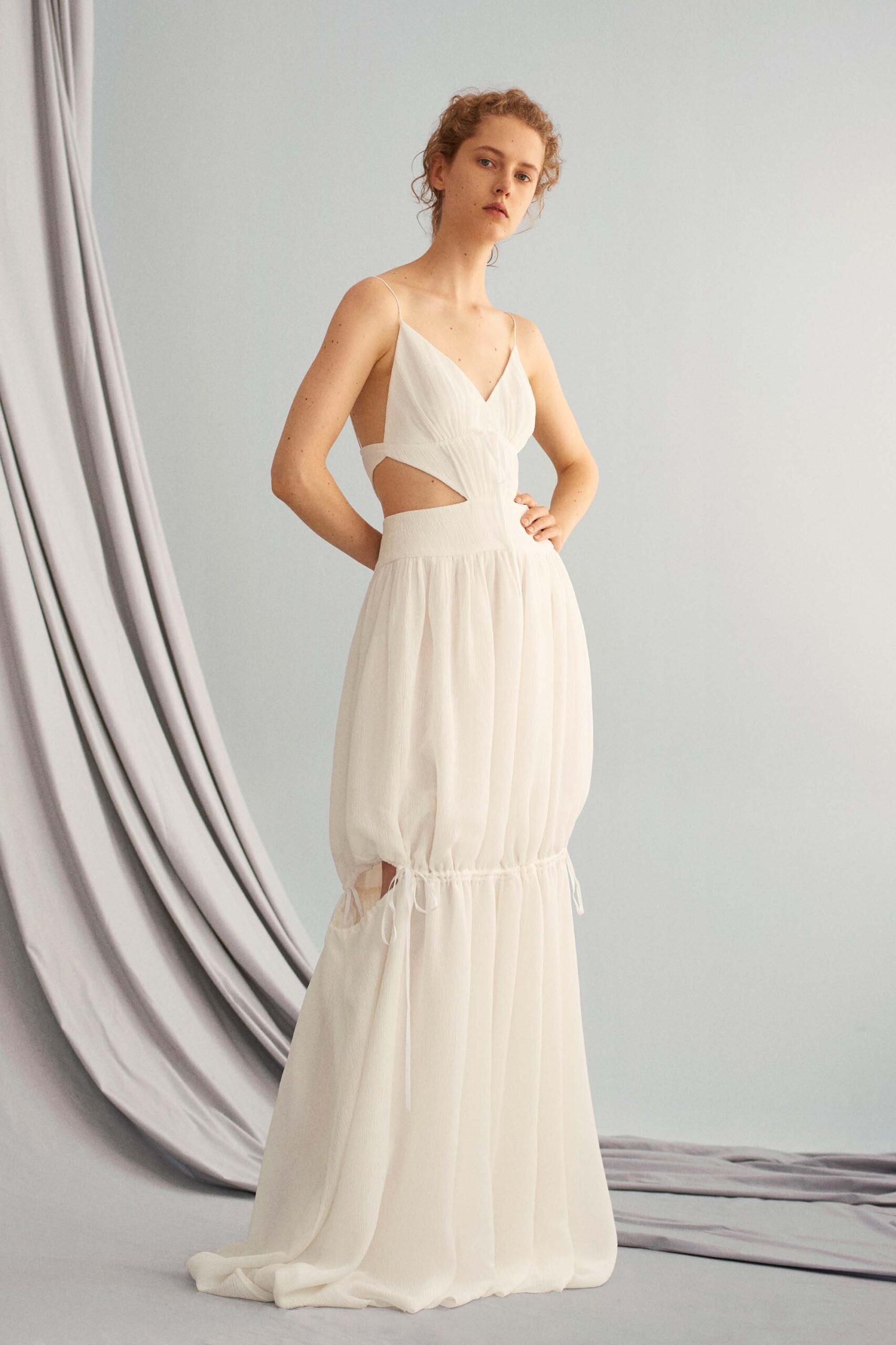 white chiffon sleeveless gown