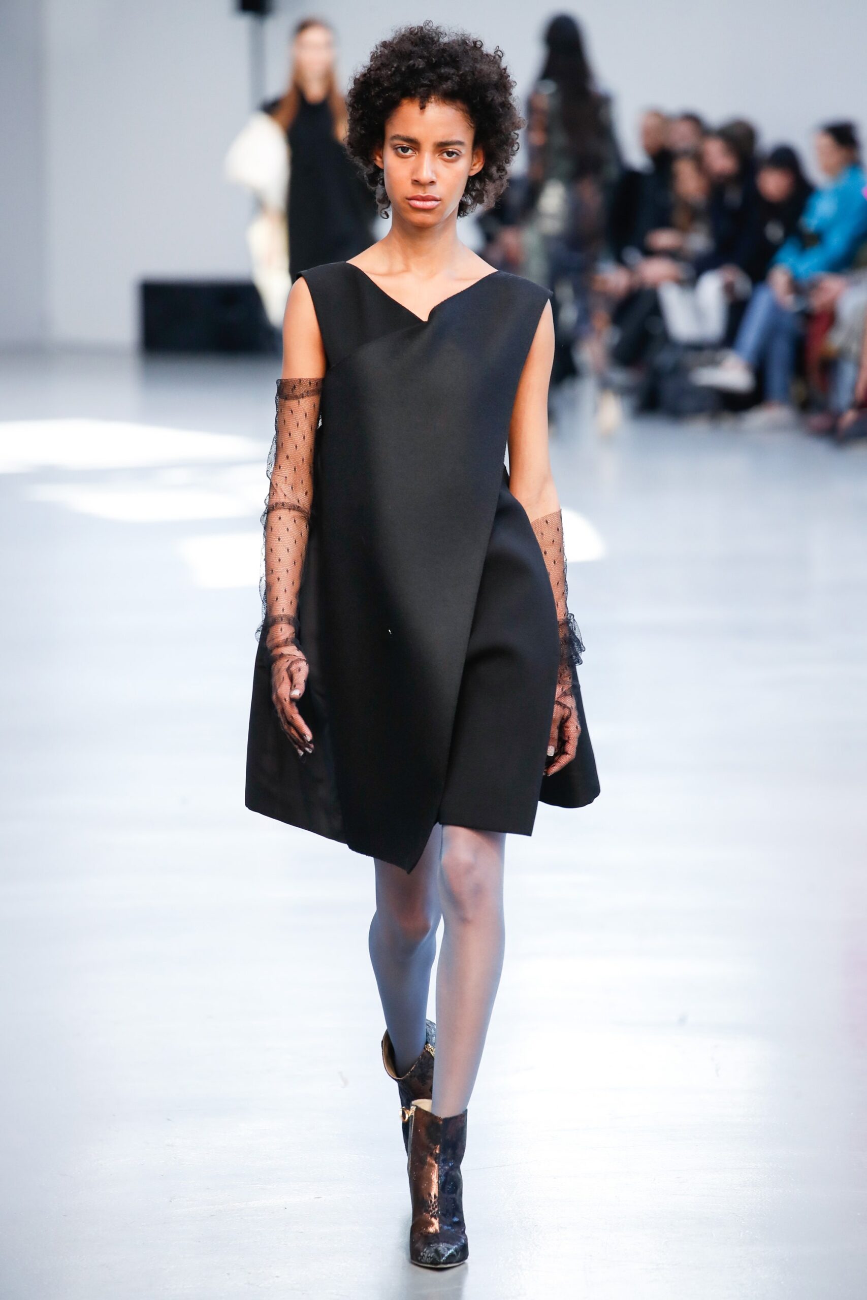 black asymmetric mini dress with gloves
