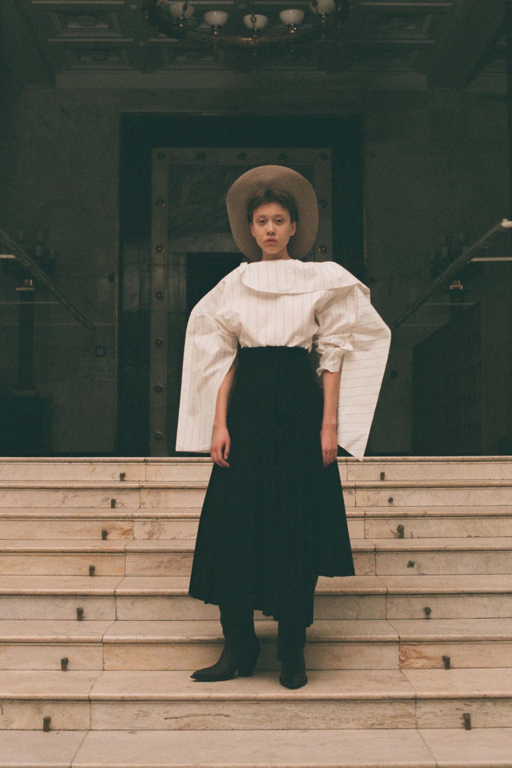 white blouse black midi skirt