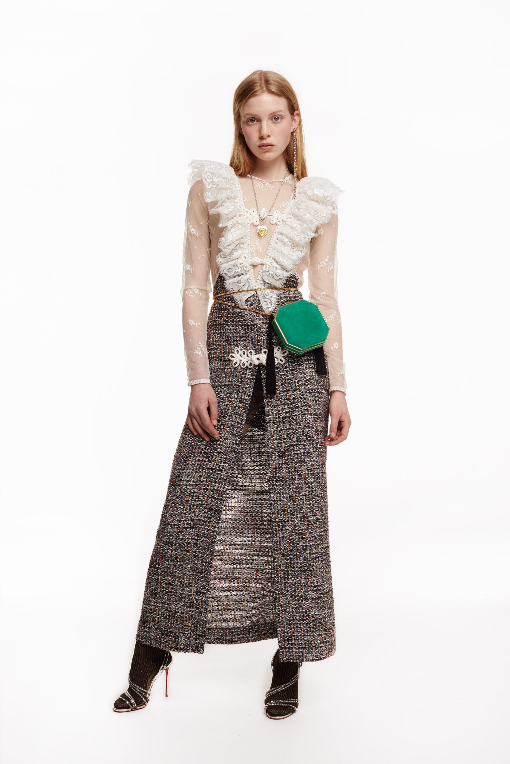 white ruffled blouse and multi skirt