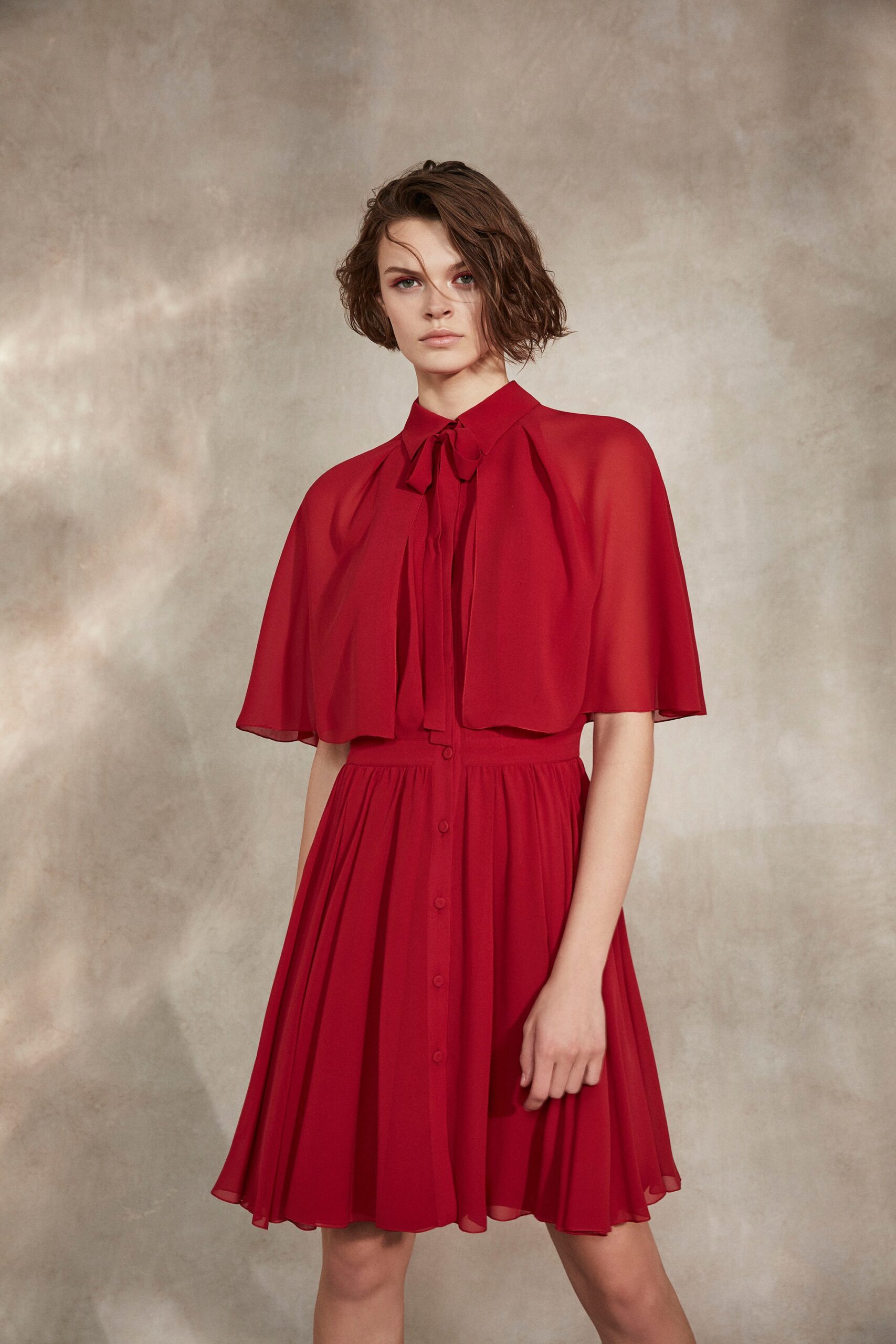 red chiffon dress with cape