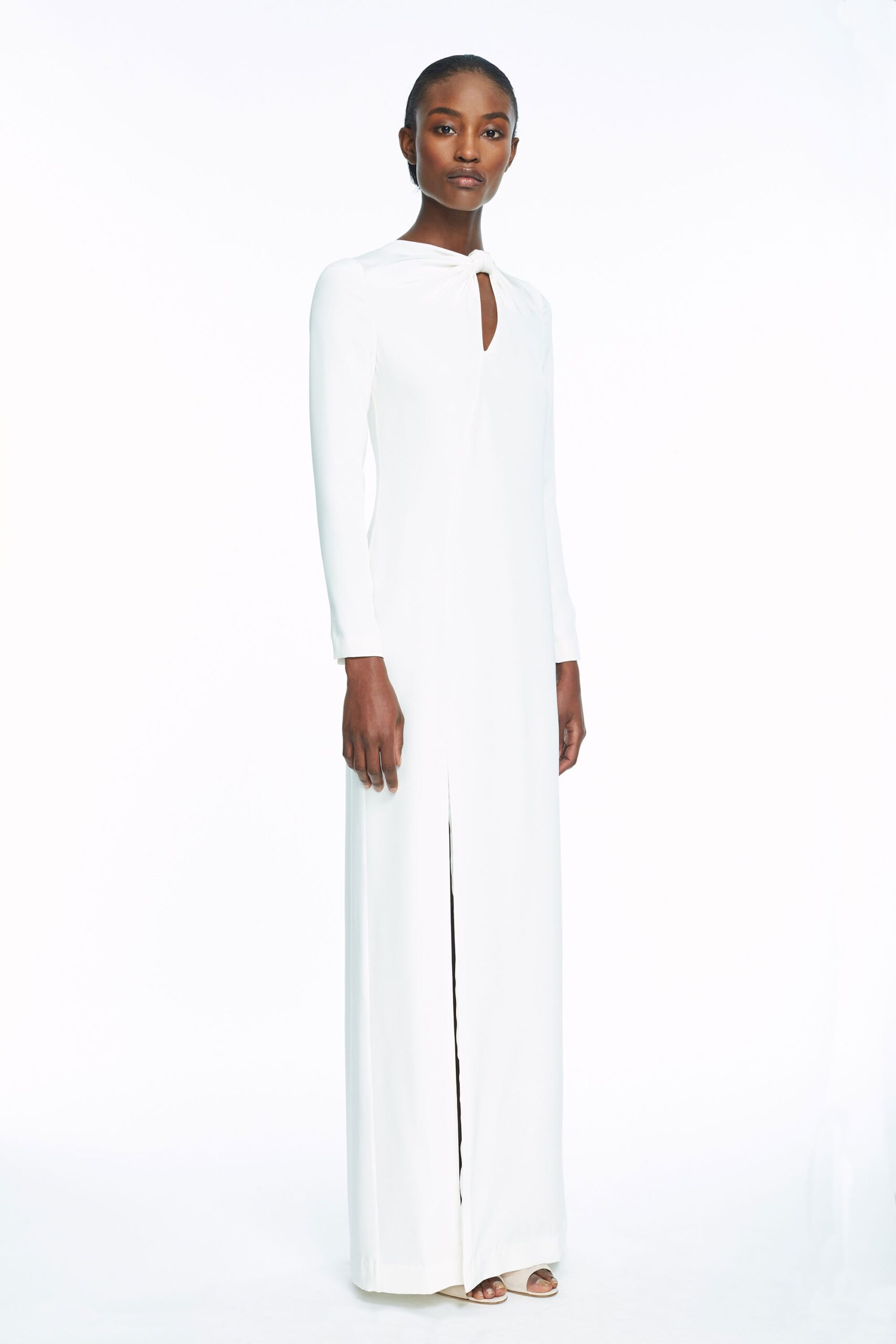 white fitted long-sleeve gown
