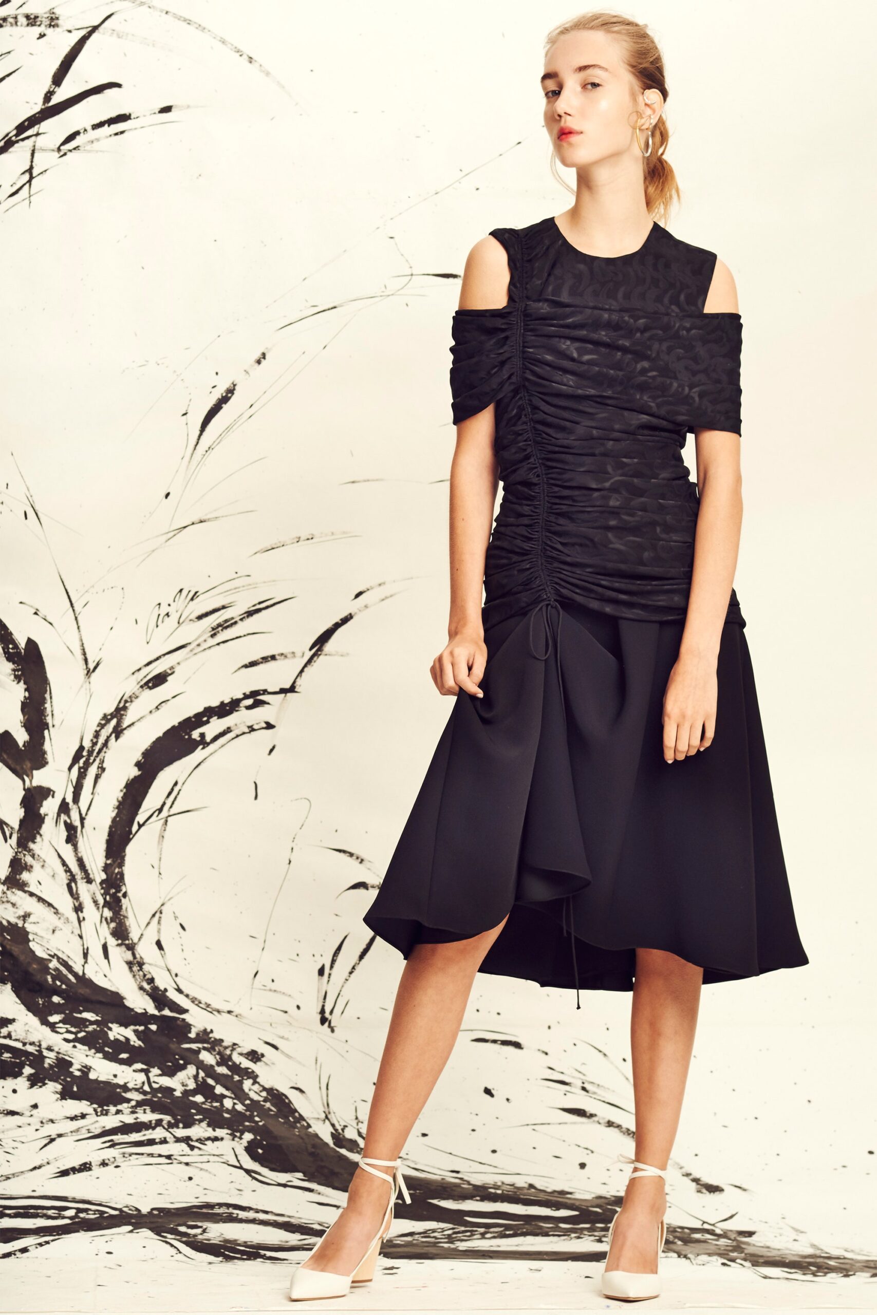 black cotton asymmetric fitted flared midi skirt