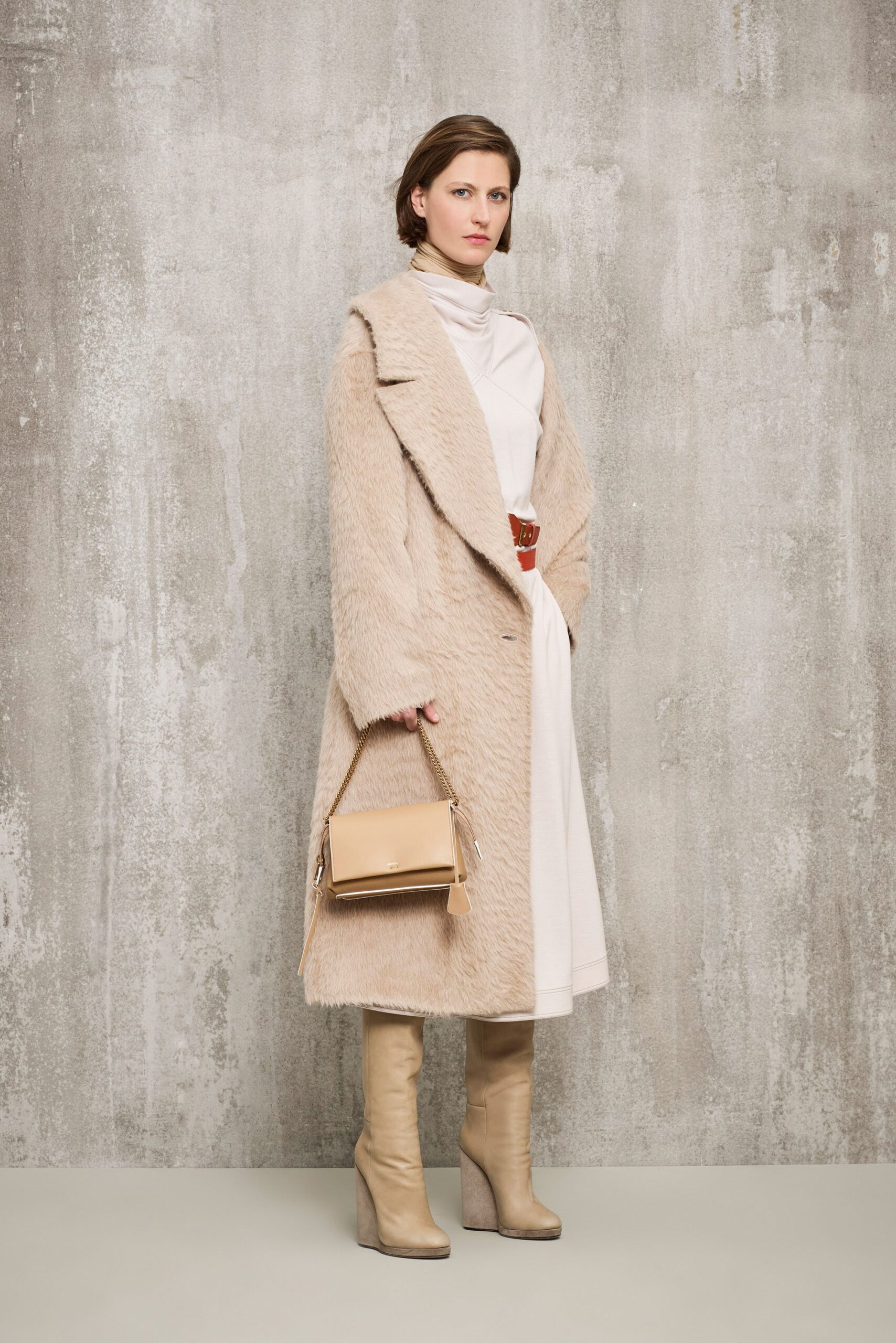 beige faux-fur coat and white dress