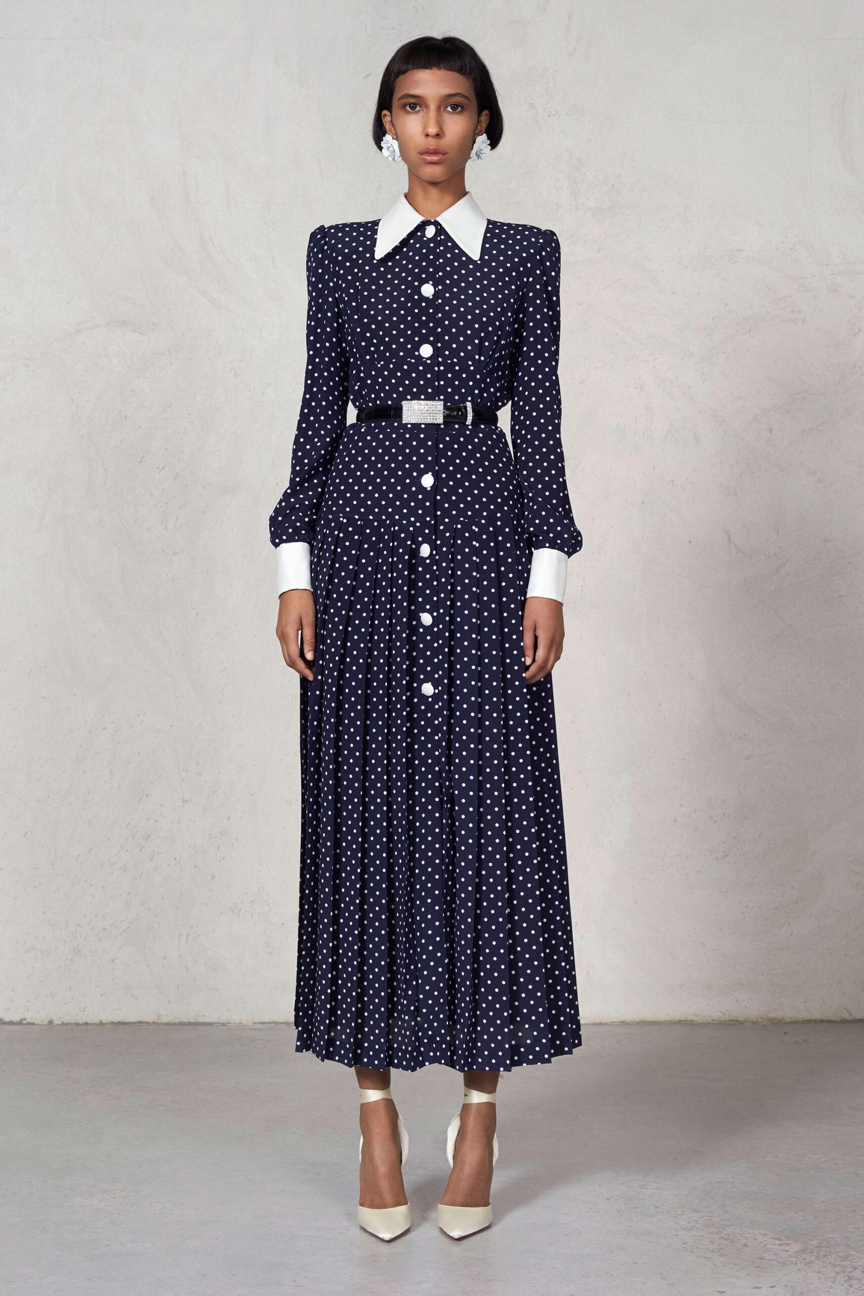 navy and white polka-dot dress