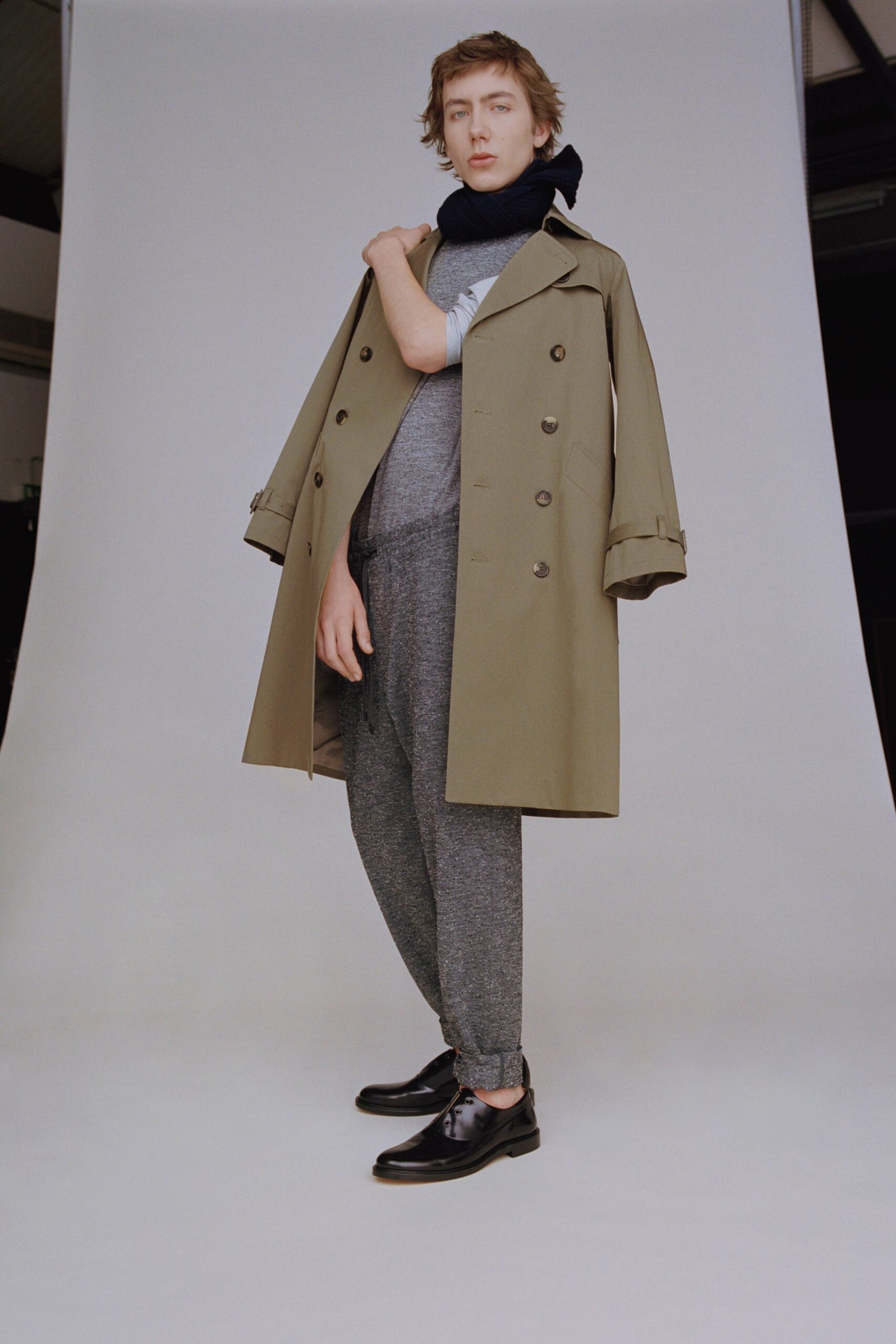 beige double-breasted coat with gray top