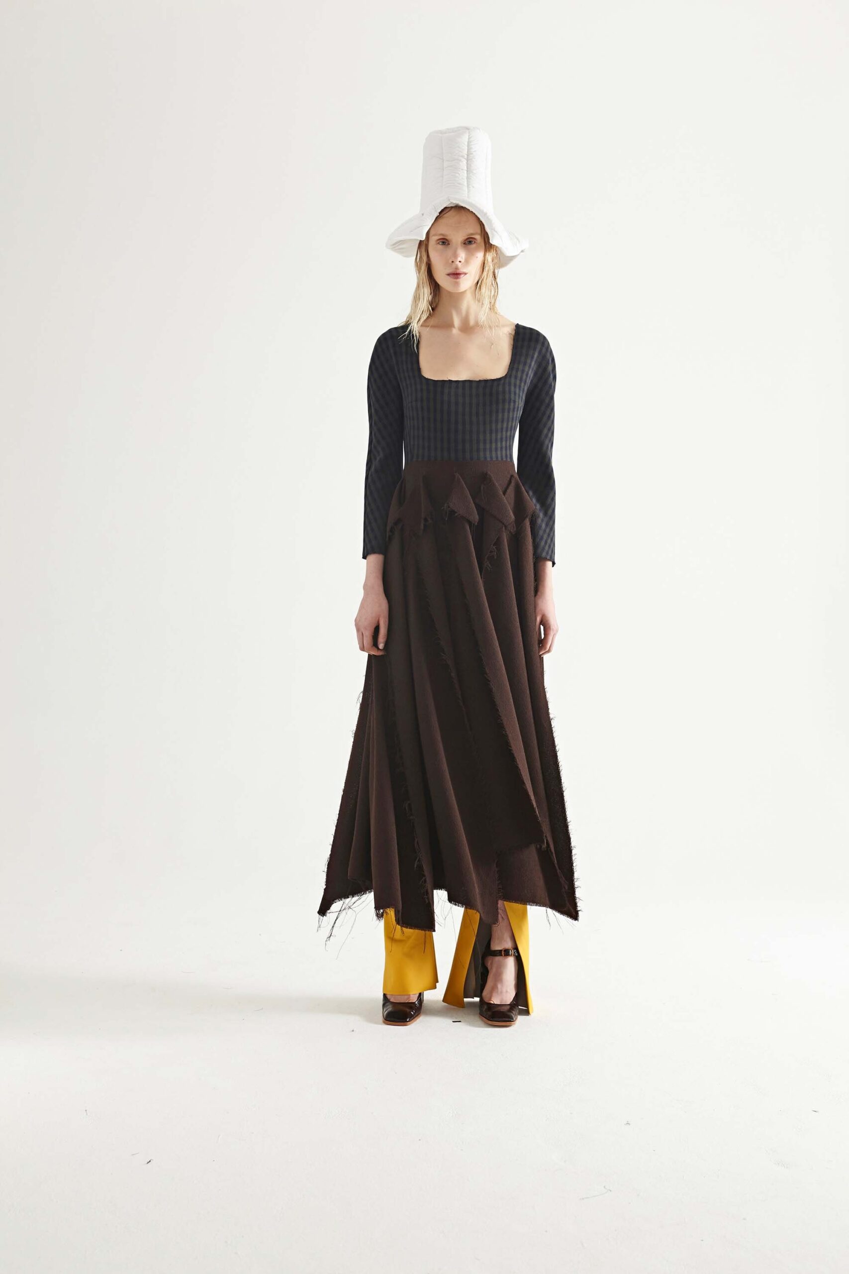 brown pleated maxi dress with yellow pants