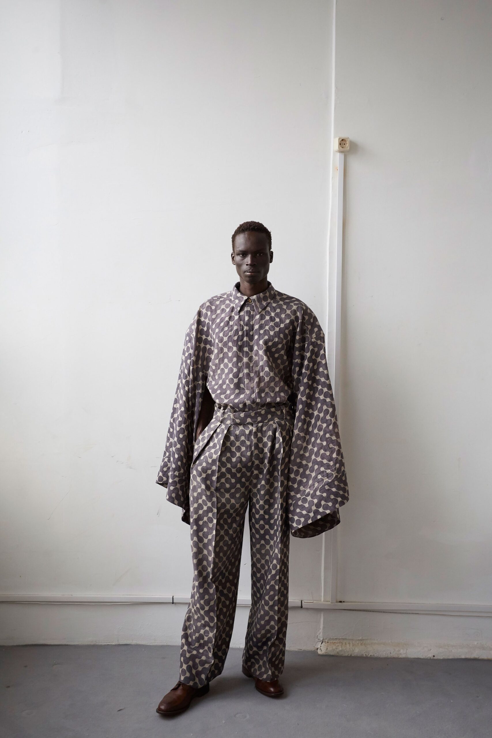 brown and beige printed shirt and pants